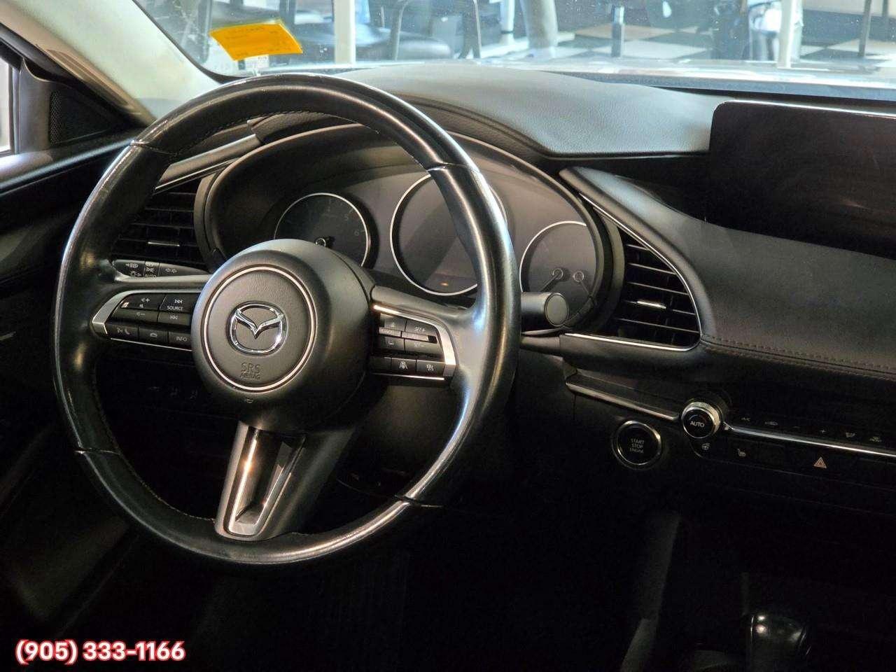 2024 Mazda 3 GT w/Turbo Bose® 12-Speaker Premium Audio • Active Driving Display (HUD) • Leather-Trimmed Upholstery • i-Activ AWD • Wir Photo