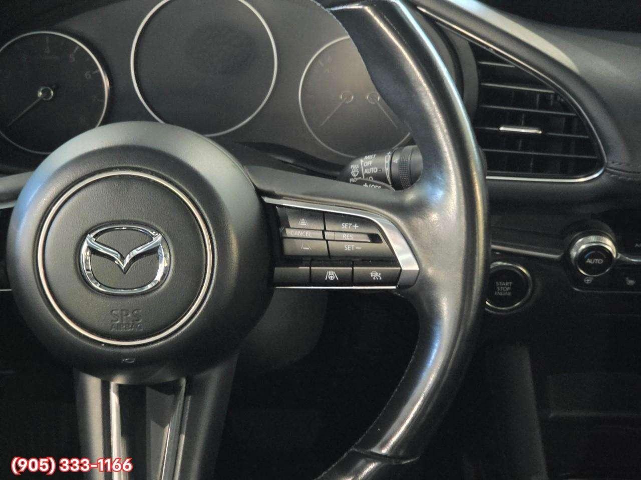 2024 Mazda 3 GT w/Turbo Bose® 12-Speaker Premium Audio • Active Driving Display (HUD) • Leather-Trimmed Upholstery • i-Activ AWD • Wir Photo