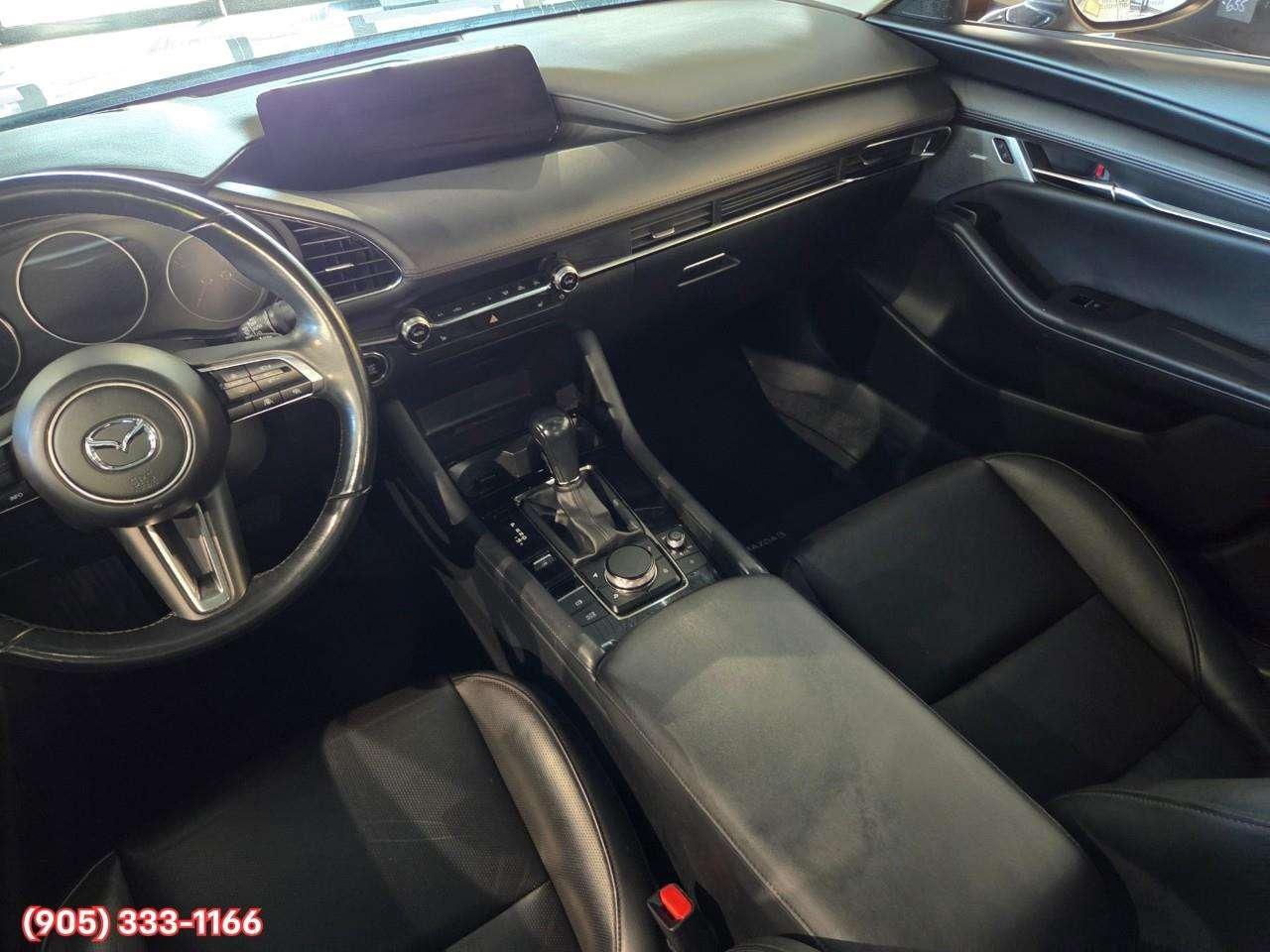2024 Mazda 3 GT w/Turbo Bose® 12-Speaker Premium Audio • Active Driving Display (HUD) • Leather-Trimmed Upholstery • i-Activ AWD • Wir Photo