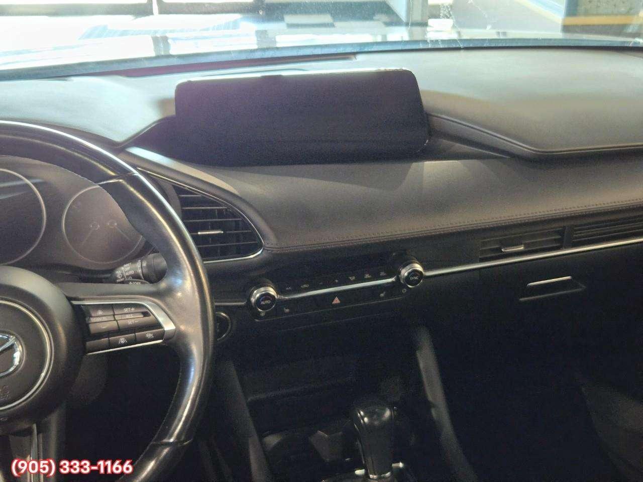 2024 Mazda 3 GT w/Turbo Bose® 12-Speaker Premium Audio • Active Driving Display (HUD) • Leather-Trimmed Upholstery • i-Activ AWD • Wir Photo