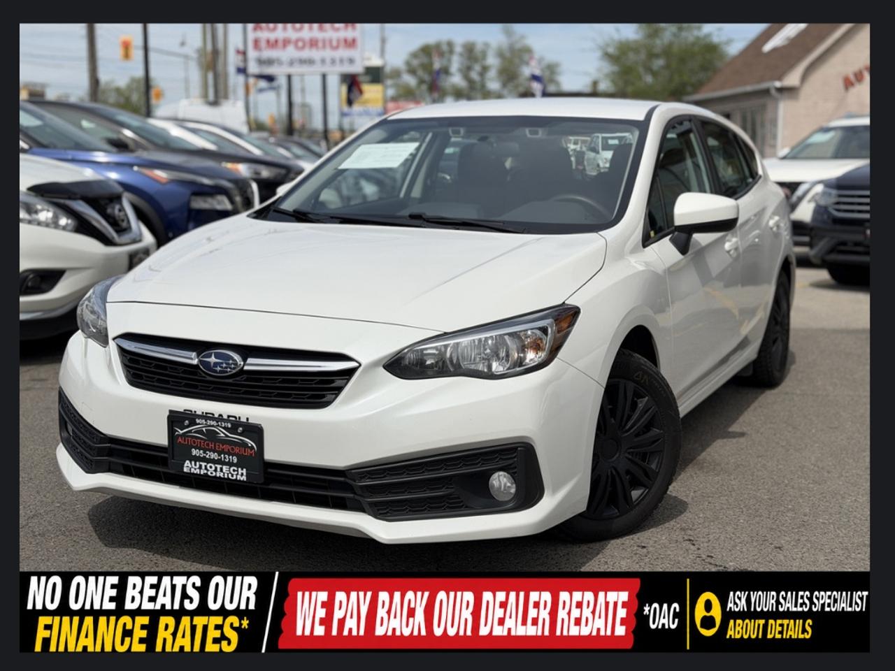 2022 Subaru Impreza Convenience AWD Pearl White w/ Eyesight Pkg   Lane Photo