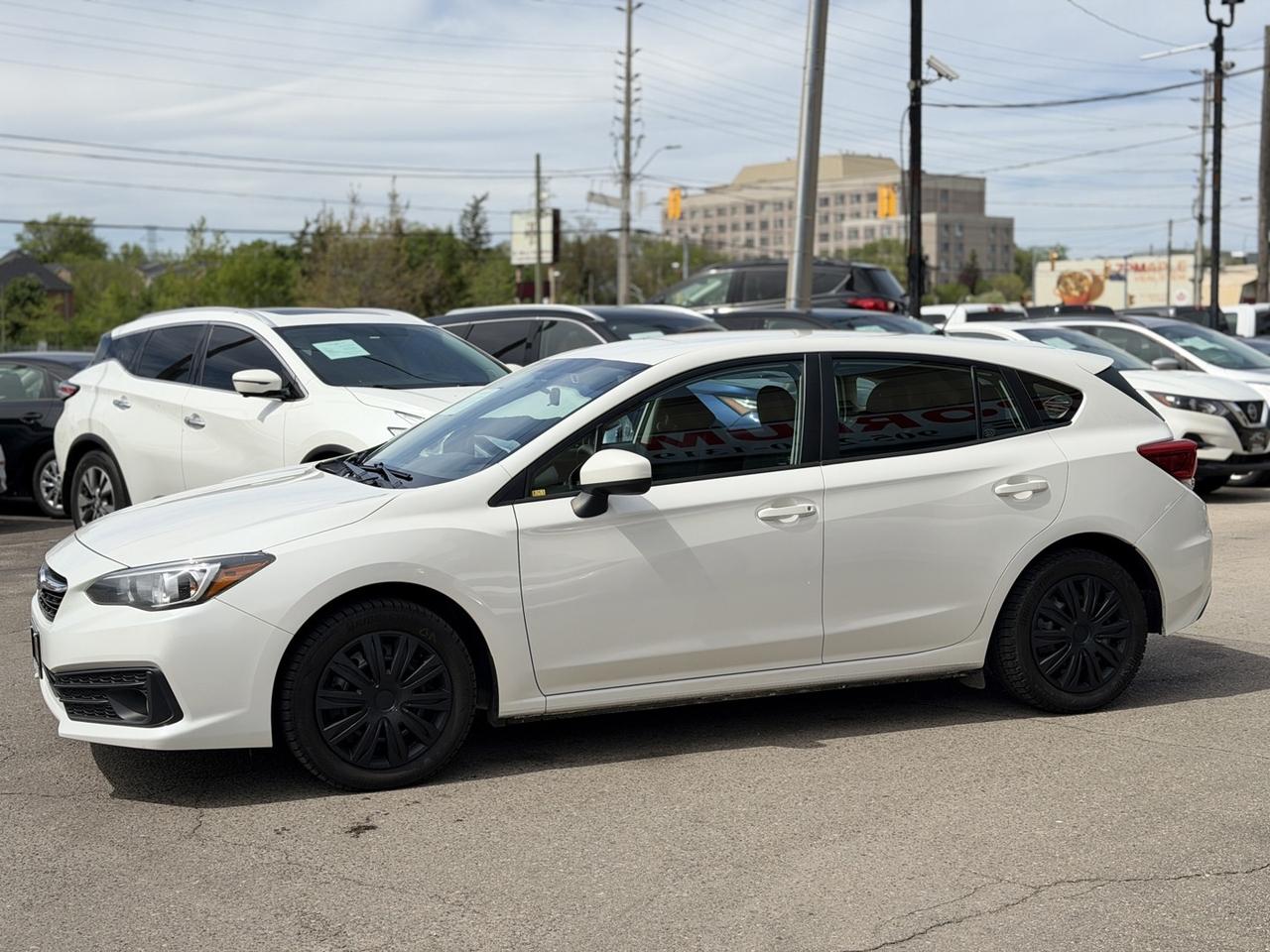 2022 Subaru Impreza Convenience AWD Pearl White w/ Eyesight Pkg   Lane Photo