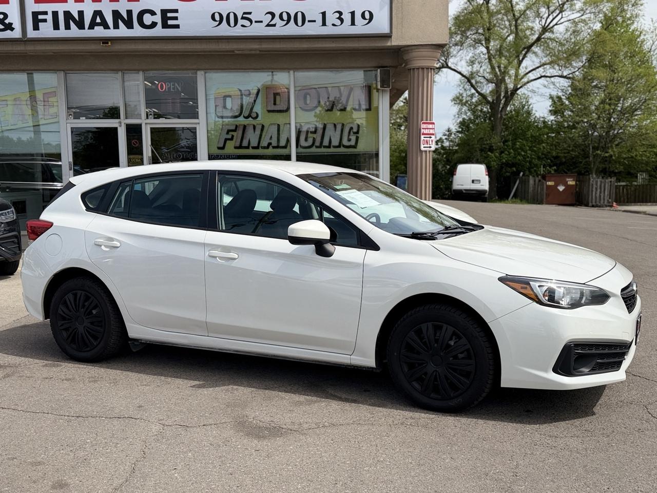 2022 Subaru Impreza Convenience AWD Pearl White w/ Eyesight Pkg   Lane Photo