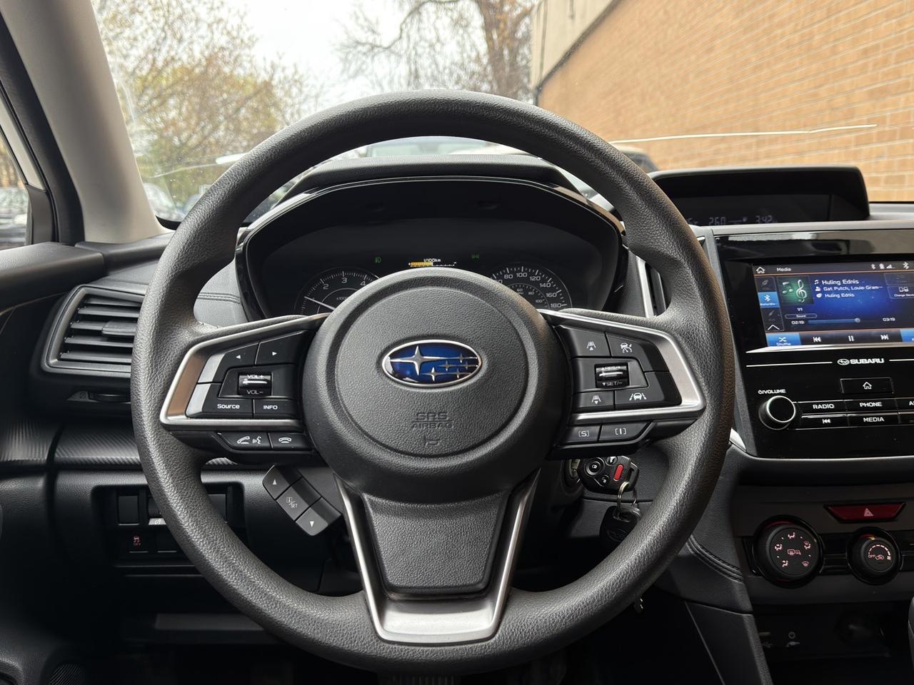 2022 Subaru Impreza Convenience AWD Pearl White w/ Eyesight Pkg   Lane Photo