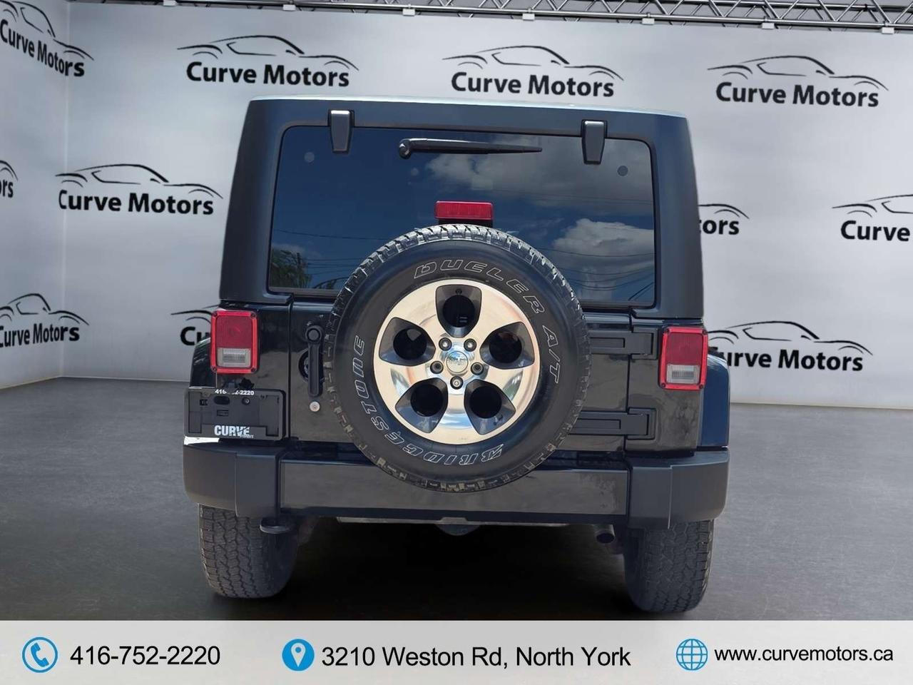 2017 Jeep Wrangler Sahara 4WD * 1 OWNER / LEATHER / NAVIGATION / LOW KM / HEATED SEATS Photo