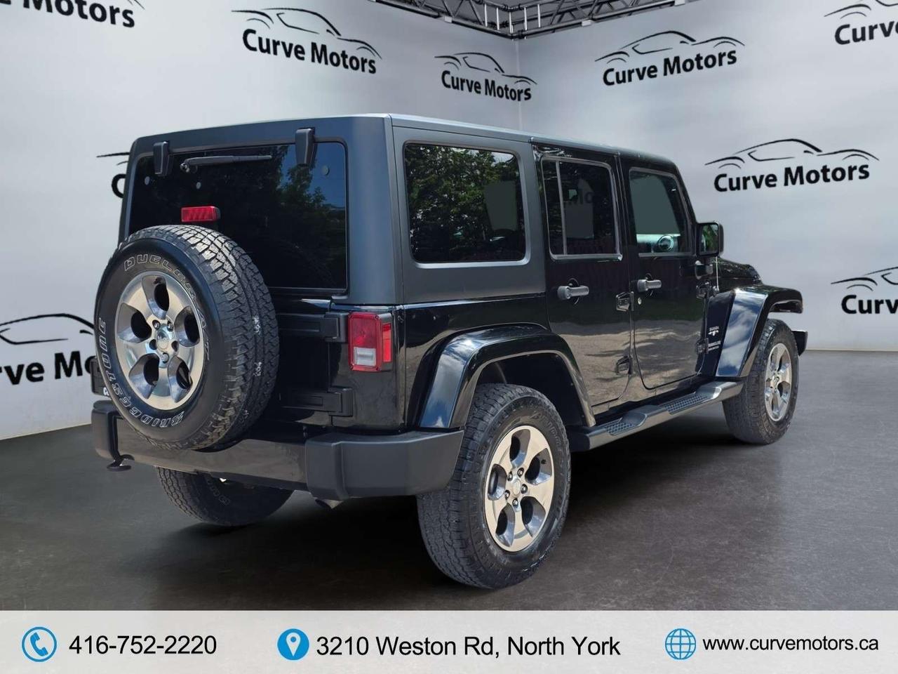 2017 Jeep Wrangler Sahara 4WD * 1 OWNER / LEATHER / NAVIGATION / LOW KM / HEATED SEATS Photo