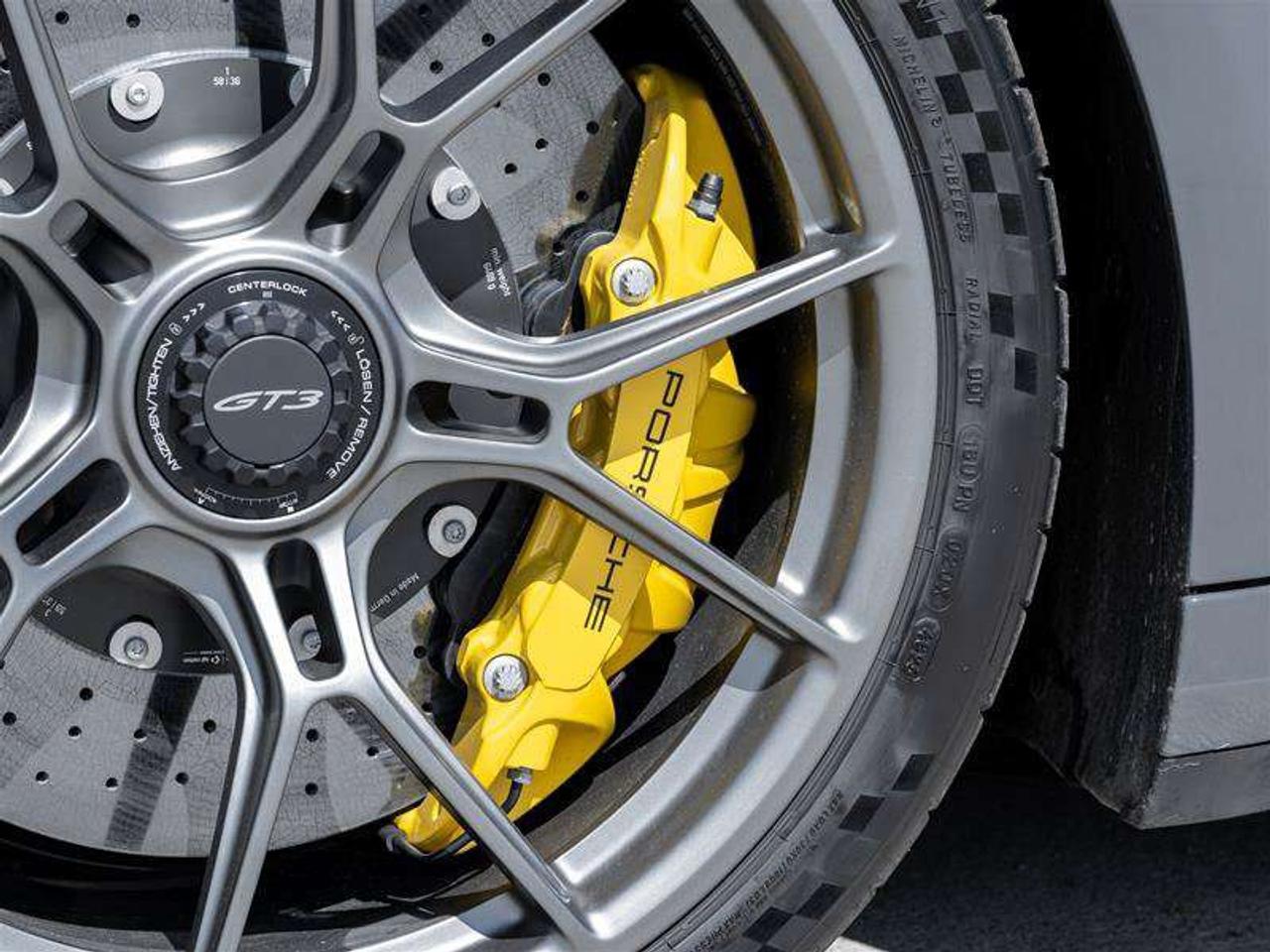 2026 Porsche 911 GT3 Coupe Weissach Pkg Porsche Ceramic Composite Brakes (PCCB) with Calipers in Yellow HD-Matrix Des Photo