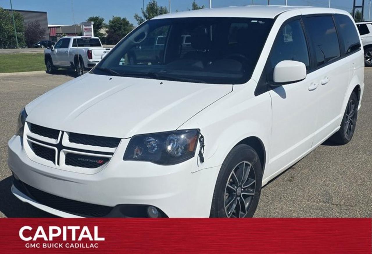 How could you possibly fit everyone? With a third row seat adding room for more passengers! The Dodge Grand Caravan has been Canadas best selling minivan for over 29 years. This van has a White exterior color and a FWD Regular Unleaded V-6 3.6 L engine. Featuring industry exclusive stow n go seating as well as recognition as a 2013 Top Safety Pick from the Insurance Institute for Highway Safety. This van is ready for anything, equipped with options including bucket seating, keyless entry, cruise control, dual zone climate controls, rear window defroster, telescopic steering wheel, ABS, rear window wiper, tinted windows, audio input jack, steering wheel audio controls, stability control and more. Contact us today to schedule a test drive!Check out this vehicles pictures, features, options and specs, and let us know if you have any questions. Helping find the perfect vehicle FOR YOU is our only priority.P.S...Sometimes texting is easier. Text (or call) 306-801-9090 for fast answers at your fingertips!Dealer License #914248Disclaimer: All prices are plus taxes & fees. See dealer for Details. Dealer Permit # 914248