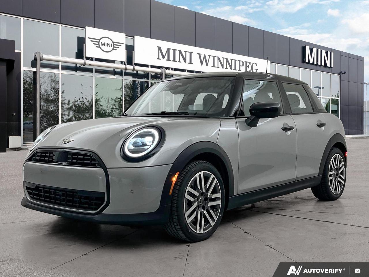 The 2026 MINI 5 Door Cooper C in Melting Silver III Metallic is a sharp, well-equipped hatchback that punches well above its class. With a twin sunroof setup, dual-zone automatic climate control, and a comprehensive suite of driver assistance tech, this particular buildloaded with the Premier Line, Premier+ Line, Classic Style, and Comfort Packageoffers a level of refinement and practicality that makes it genuinely hard to overlook.

- Twin sunroof: panoramic-style setup with both a sliding/tilting front sunroof and a fixed rear glass panel with sunshade
- Comfort Package adds heated front seats and a heated steering wheel for year-round comfort
- 7-Speed Double Clutch transmission paired with a 2.0L Twin Power Turbo engine for responsive, efficient performance
- Wireless Apple CarPlay and Android Auto with full steering wheel and voice controls
- Dual-zone front automatic air conditioning with independent driver and passenger temperature settings
- Comprehensive driver assistance: Blind Spot Detection, Lane Departure Warning, Rear Collision Warning, Front Collision Mitigation, and front/rear parking sensors
- Proximity keyless entry with push-button start and FOB-controlled sunroof, windows, and cargo access
- Fuel economy rated at 8.5 L/100 km city and 6.0 L/100 km highwaypractical for daily driving

Ready to see it in person? Visit Birchwood BMW online at www.birchwoodbmw.ca to reserve this vehicle, start your purchase, or book a test drive. Our team is happy to answer any questions and help you find the right fit.
At Birchwood BMW we know that experience is everything - thats why weve been voted #1 BMW Store in Canada for Customer Satisfaction for the past 3 years.  

Visit us today and see for yourself why were the top-rated luxury dealer in Manitoba on Google. Book your appointment at 204-452-7799. Dealer Permit #9740
Dealer permit #9740