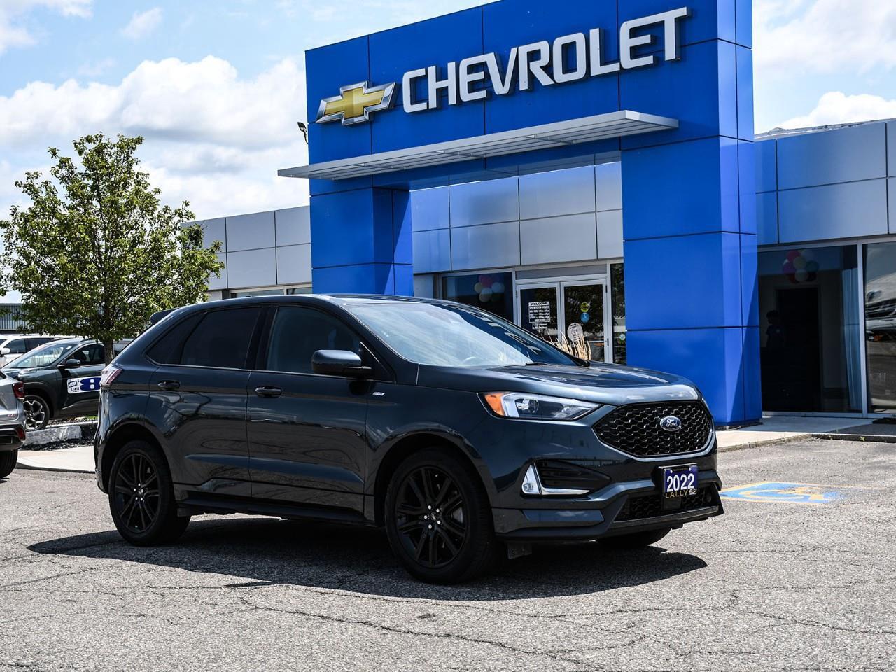 2022 Ford Edge ST Line AWD EcoBoost 2.0L I4 GTDi DOHC Turbocharged VCT 8-Speed Automatic Blue Metallic AWD. Odometer is 13295 kilometers below market average!<br /><br />** Special Sale price listed is available to finance purchases only on approved credit. Price of vehicle may differ with other forms of payment.<br /><br /><br />What is Live Market Pricing?<br /><br />Lally Chevrolet, we've changed the way we sell new and pre-owned vehicles with Live Market Pricing. Buying a vehicle can be stressful. Negotiations, trade value, hidden fees and the time a purchase takes is enough to make anyone nervous.<br /><br />How does a customer know if they are getting a good deal or not?<br /><br />How do dealerships like Lally Chevrolet even set prices?<br /><br />In today's customer-centric, tech-savvy world, where is the transparency in the car buying process?<br /><br />We want to make your vehicle purchasing experience stress-free, simple, enjoyable and transparent. So we've made the struggle of negotiating a thing of the past!<br /><br />No More Stressful Negotiations!<br /><br />Purchasing your next vehicle shouldn't feel like a battle. Our team at Lally Chevrolet does not want you to go home wondering if you could have gotten a better deal or not. So, we are offering you the best deal possible, the fair value, with Live Market Pricing.<br /><br />How Does Live Market Pricing Work?<br /><br />With Live Market Pricing, our team checks the fair value of our vehicles every day, comparing equally-equipped vehicles in a 300 kilometer radius of our market area. Then, we update our inventory prices in real-time to reflect the current market price.<br /><br />This allows us to price our vehicles in our market area fairly while passing the savings onto you. With Lally Chevrolet Live Market Pricing system, you can rest assured that you're getting the most competitive price around town.<br /><br />These real-time results offer fair pricing for you, the customer, and eliminates the need for negotiations. Lally Chevrolet Live Market Pricing ensures:<br /><br />? no pricing games<br />? no stressful negotiations or pressure situations<br />? no mark-up to mark-down gimmicks<br />? no hassling<br />? no haggling<br />? no more guessing<br /><br />.