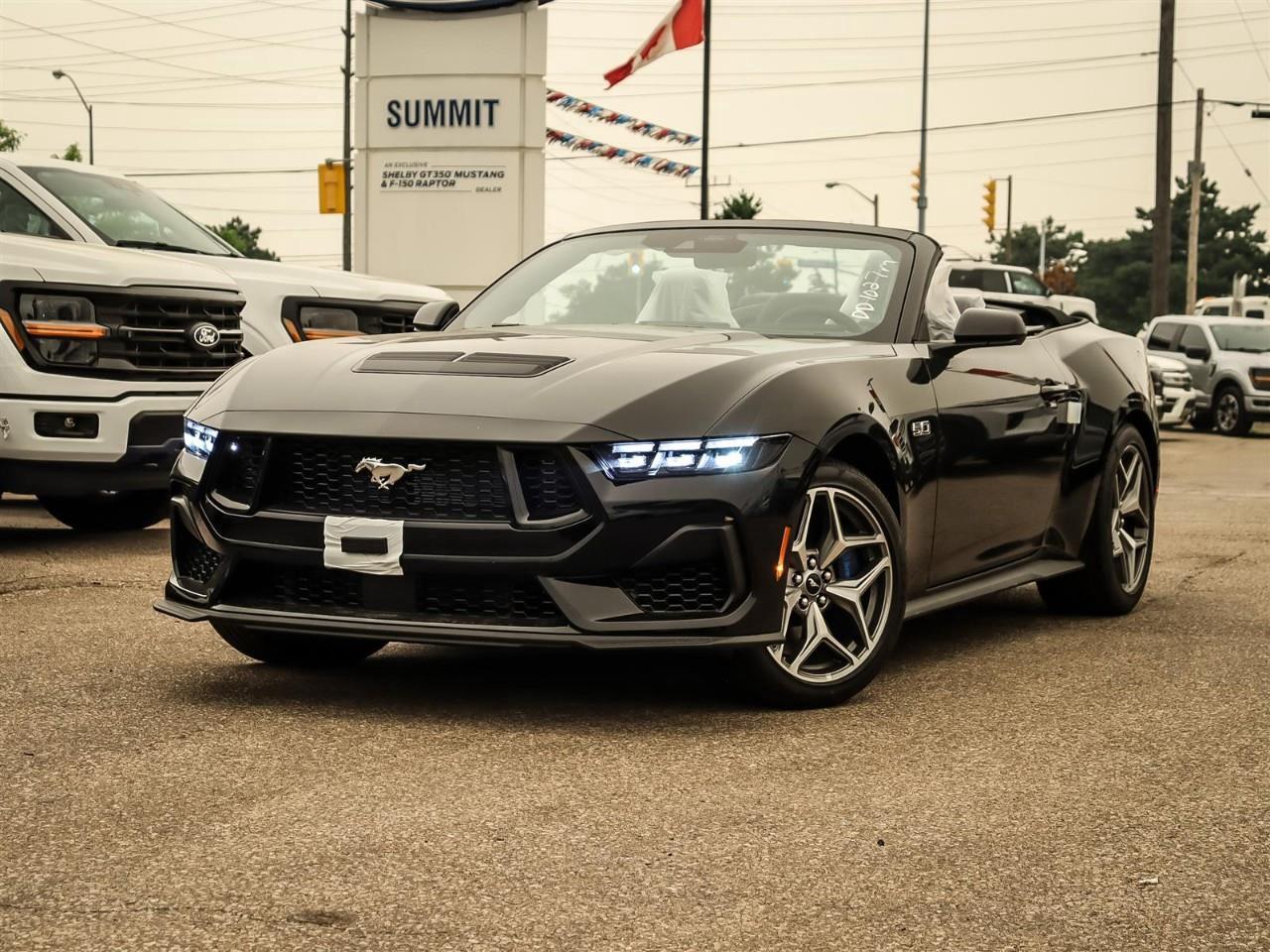 <p>The 2026 Ford Mustang GT Premium Convertible in black, with its rear-wheel drive and dynamic handling, promises a driving experience unlike any other. Exuding power and elegance, this new model is fitted with a capable manual transmission, optimized for pure driving pleasure.</p> <p>The Mustang's striking exterior is complemented by its sleek convertible body style and 19" machined tarnished dark aluminum wheels, designed for optimal performance. Inside, you'll find the comfort of Black Onyx ActiveX climate-controlled bucket seats, which include heated and cooled features, making every journey luxurious. The vehicle's well-appointed interior is enhanced by leatherette door trim inserts and a leather/metal-look gear shifter, ensuring sophistication at every touch.</p> <p>Technologically advanced, this Mustang features a backup camera for ease of parking, along with modern Bluetooth connectivity. The B&O sound system by Bang & Olufsen offers an immersive audio experience with its 12 speakers, including a subwoofer. Safety and convenience are paramount with Ford Co-Pilot360 Assist+, providing adaptive cruise control, lane centering assist, and pre-collision assist with automatic emergency braking. Additional driver aids include the Lane-Keeping System and Blind Spot Assist, ensuring you stay aware and in control.</p> <p>Performance enthusiasts will appreciate features like the Brembo brake system, Active Valve Performance Exhaust, and the GT Performance Package, which includes unique chassis tuning and high-performance summer tires. Whether you're a driving aficionado or an enthusiast of the latest automotive technology, this Mustang offers a thrilling ride. Contact Summit Ford today to learn more about this remarkable vehicle and schedule your test drive.</p>
