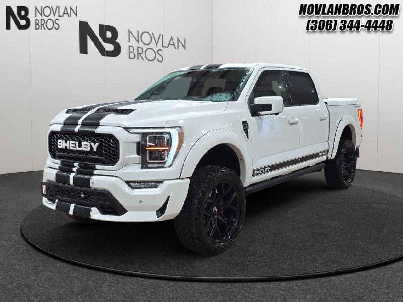 <b>Low Mileage, SHELBY OFF ROAD,  775 Supercharged 5.0L V8,  Shelby by FOX suspension system,  22 inch Shelby alloy wheels,  35 inch premium all terrain tires!</b><br> <br> Check out our great inventory of pre-owned vehicles at Novlan Brothers!<br> <br>  The Ford F-Series is the best-selling vehicle in Canada for a reason. Its simply the most trusted pickup for getting the job done. This 2022 Ford F-150 is for sale today in Paradise Hill. <br> <br>The perfect truck for work or play, this versatile Ford F-150 gives you the power you need, the features you want, and the style you crave! With high-strength, military-grade aluminum construction, this F-150 cuts the weight without sacrificing toughness. The interior design is first class, with simple to read text, easy to push buttons and plenty of outward visibility. With productivity at the forefront of design, the F-150 makes use of every single component was built to get the job done right!This low mileage  Crew Cab 4X4 pickup  has just 20,047 kms. Its White in colour and is completely accident free based on the <a href=https://vhr.carfax.ca/?id=GoCn6mVzPyDErwOHsxNy7VAqat9AXUuL target=_blank>CARFAX Report</a>. It has a 10 Speed Automatic transmission and is powered by a  775HP 5.0L 8 Cylinder Engine.  This vehicle has been upgraded with the following features: SHELBY OFF ROAD,  775 Supercharged 5.0L V8,  Shelby by FOX suspension system,  22 inch Shelby alloy wheels,  35 inch premium all terrain tires,  Shelby spec interior upgrade,  Shelby Body/Hood/Fenders. <br> To view the original window sticker for this vehicle view this <a href=http://www.windowsticker.forddirect.com/windowsticker.pdf?vin=1FTFW1E55NFA88115 target=_blank>http://www.windowsticker.forddirect.com/windowsticker.pdf?vin=1FTFW1E55NFA88115</a>. <br/><br> <br>To apply right now for financing use this link: <a href=http://novlanbros.com/credit/ target=_blank>http://novlanbros.com/credit/</a><br><br> <br/><br>The Novlan family is owned and operated by a third generation and committed to the values inherent from our humble beginnings.<br> Come by and check out our fleet of 20+ used cars and trucks and 50+ new cars and trucks for sale in Paradise Hill.  o~o