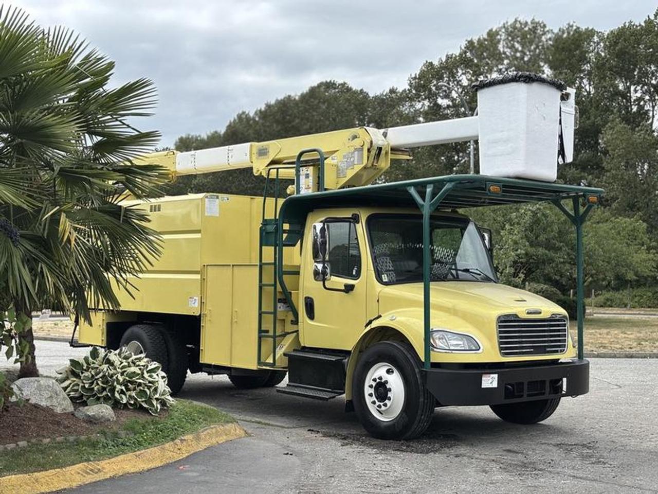 This 2014 Freightliner M2 106 is powered by a 6.7L Cummins diesel engine paired with an automatic transmission and configured as a 4x2. Equipped with a Terex Hi-Ranger XT60 aerial lift and integrated chipper body, this truck is configured for tree trimming, utility line work, vegetation management, and municipal fleet operations.

The truck features a Terex Hi-Ranger XT60 bucket with an approximate 60-foot working height, along with a power take-off (PTO) system, air brakes, outriggers, and multiple tool storage compartments. Additional equipment includes a pintle trailer hitch, trailer brake controller, locking differential, exhaust brake, strobe lights, cruise control, AM/FM radio, and air conditioning and heat.

The truck has an approximate overall height of 12 feet 8 inches.

Finished in yellow with a gray vinyl interior, this Freightliner M2 106 provides a commercial aerial lift and chipper truck platform suited for arborist, utility, and vegetation management applications. This item is currently OFFSITE. You must register an appointment with our office to schedule an offsite viewing. Appointments must be made a minimum of one business day in advance (and as defined by the days that Repo.com is open for business) before your appointment can be scheduled and confirmed. We may, at our own discretion, instead opt to transport smaller items to Repo.coms main yard for viewing purposes.  $138,810.00 plus $375 processing fee, $139,185.00 total payment obligation before taxes.   Listing report, warranty, contract commitment cancellation fee, financing available on approved credit (some limitations and exceptions may apply). All above specifications and information is considered to be accurate but is not guaranteed and no opinion or advice is given as to whether this item should be purchased. We do not allow test drives due to theft, fraud, acts of vandalism and undetectable impaired driving. Instead we provide the following benefits: Complimentary Warranty (with options to extend), Limited Money Back Satisfaction Guarantee on Fully Completed Contracts, Contract Commitment Cancellation, and an Open-Ended Sell-Back Option. Ask seller for details or call 604-522-REPO(7376) to confirm listing availability.