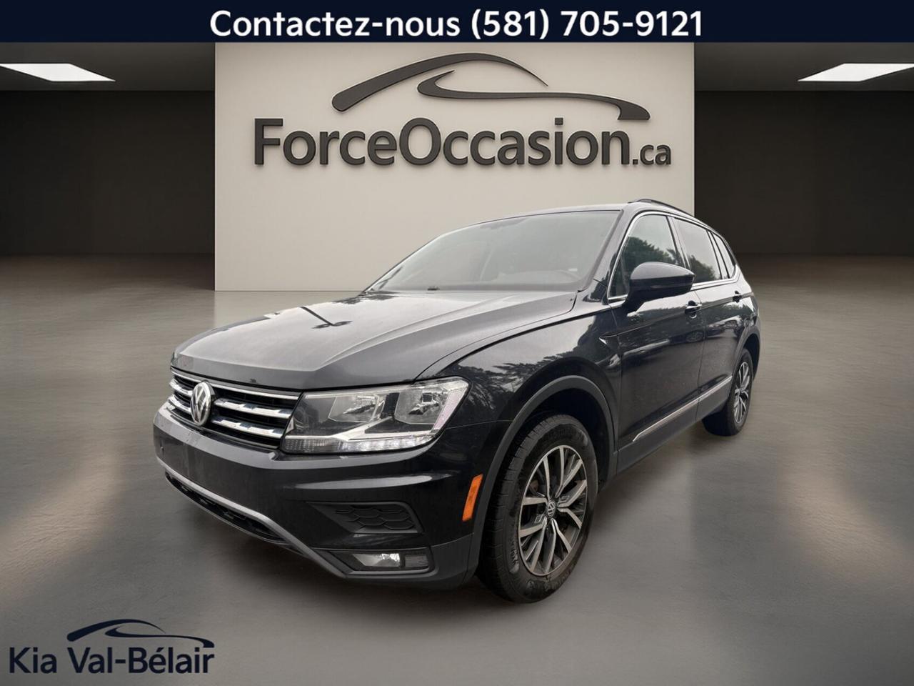 Très propre // Un seul propriétaire // Inspecté en 135 points

Le Volkswagen Tiguan 2018 Comfortline à rouage intégral proposé par Kia Val-Bélair à Québec se présente en noir, avec 101 088 km à lodomètre, une transmission automatique et un moteur 2,0 litres à essence. Ce VUS usagé mise sur un bon équilibre entre confort, sécurité, connectivité et polyvalence au quotidien.

CARACTÉRISTIQUES DU TIGUAN COMFORTLINE * 4MOTION * CUIR * TOIT * BI-ZONE * SIÈGES CHAUFF *
»» Rouage intégral 4MOTION pour meilleure motricité
»» Toit panoramique avec panneau ouvrant en verre
»» Climatisation automatique à deux zones
»» Siège conducteur à réglage électrique

CARACTÉRISTIQUES DE SÉCURITÉ AVANCÉES
»» Caméra de recul pour manoeuvres simplifiées
»» Surveillance des angles morts intégrée
»» Contrôle de stabilité et système ABS
»» Coussins gonflables latéraux et rideaux

PERFORMANCE ET EFFICACITÉ
»» Moteur 2,0 litres à essence turbocompressé
»» Transmission automatique à 8 vitesses
»» Rouage intégral pour chaussées variables
»» Direction assistée pour conduite quotidienne aisée

CONFORT
»» Sièges avant chauffants pour lhiver
»» Contrôle climatique automatique à deux zones
»» Volant réglable avec commandes audio
»» Rétroviseurs chauffants et électriques pratiques

TECHNOLOGIE ET CONNECTIVITÉ
»» Intégration Bluetooth pour appels mains libres
»» Apple CarPlay mentionné dans la version
»» Démarrage par bouton-poussoir pratique
»» Radio satellite et commandes au volant

ESPACE DE CHARGEMENT
»» Hayon arrière avec accès au coffre
»» Couvre-bagage inclus pour plus de discrétion
»» Banquette utilitaire pour usage familial
»» Format VUS pratique pour le quotidien

RÉCOMPENSES ET RECONNAISSANCES
»» Top Safety Pick, Insurance Institute for Highway Safety, 2018

APPRÉCIÉ DES AUTRES PROPRIÉTAIRES
»» Conduite stable et rassurante sur route
»» Habitacle silencieux pour les longs trajets
»» Position de conduite surélevée appréciée
»» Format polyvalent pour famille et loisirs

GARANTIE
»» Garantie légale seulement
»» Garantie dusage
»» Garantie de durée raisonnable
»» Garantie contre les vices cachés

Ce Volkswagen Tiguan 2018 Comfortline se démarque par son équipement bien choisi, incluant le toit panoramique, les sièges avant chauffants, la surveillance des angles morts, la caméra de recul et la climatisation à deux zones. Avec ses 4 portes, son rouage intégral et sa présentation noire, il répond bien aux besoins dun acheteur qui veut un VUS pratique et bien équipé.

Le NIV de ce Volkswagen Tiguan Comfortline * 4MOTION * CUIR * TOIT * BI-ZONE * SIÈGES CHAUFF * 2018 est le 3VV2B7AX8JM091607 .

Garantie prolongée disponible, livraison en 48h