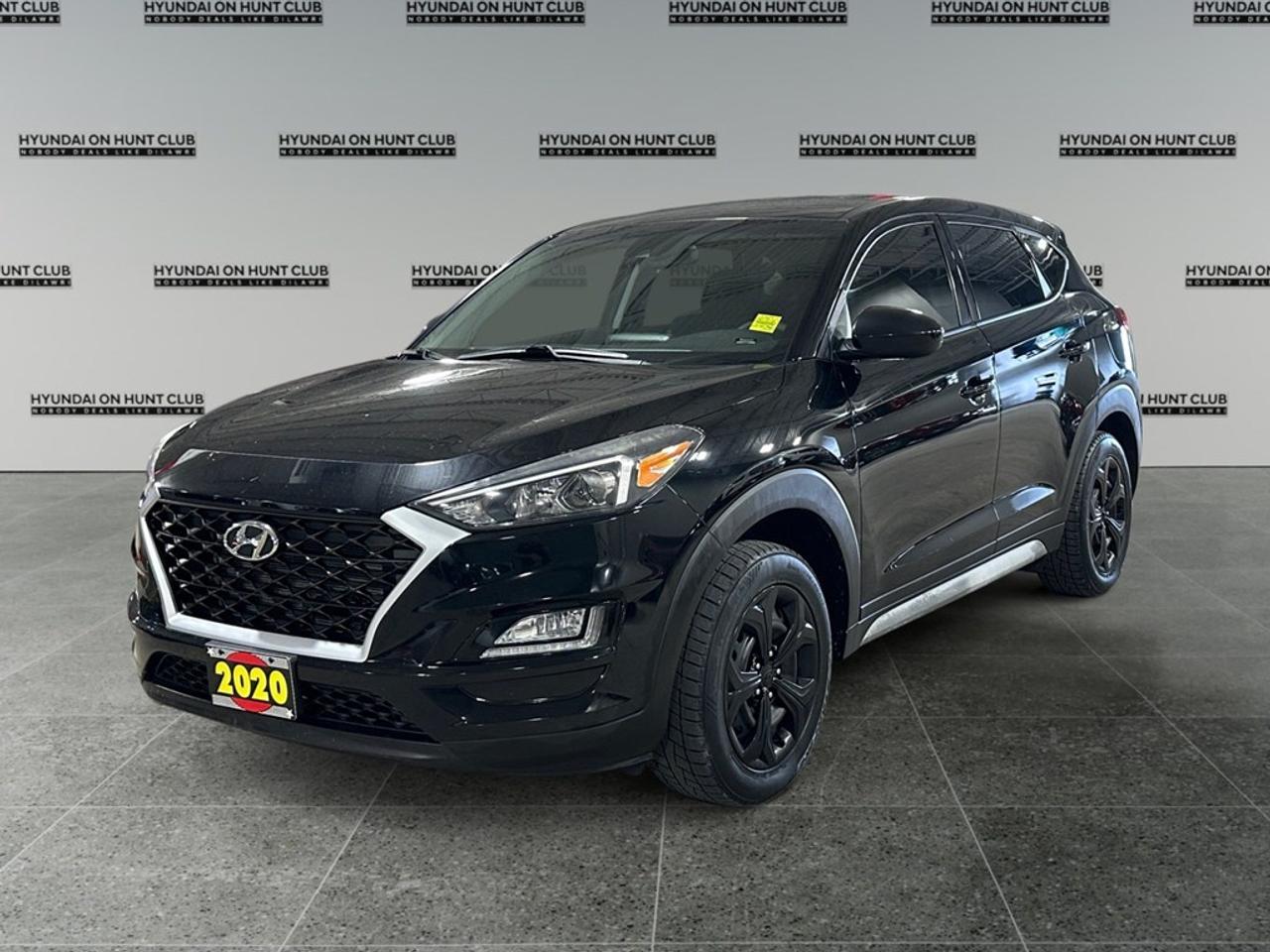 Certified Pre-Owned. The 2020 Hyundai Tucson in the elegant Essential trim presents itself in a sleek gray finish, showcasing the confidence of a Front-Wheel Drive drivetrain combined with a refined automatic transmission. Ideally suited for navigating urban streets with ease and grace, this SUV offers agile handling and an engaging driving experience. Step inside and youll be greeted by thoughtful interior touches such as heated front seats, all wrapped up in stylish design. The Tucsons spacious cabin is equipped with practical features that enhance your everyday journey, making comfort and convenience priorities. Stay connected and drive with confidence thanks to smart technology features like Bluetooth connection, smart device integration, and a clear backup camera, ensuring you keep focused on the road. With safety innovations including brake assist, lane assist, and keyless entry, youll find peace of mind on every drive. If youre in the market for a versatile SUV that blends practicality with modern technology, the Hyundai Tucson Essential FWD is designed for you. Perfect for families and adventure seekers alike, this vehicle meets your needs with flair. Contact Hyundai On Hunt Club today to arrange a test drive or find out more about this fantastic offer! **ADVERTISED PRICE IS FOR FINANCE DEALS ONLY, CASH PRICE MAY BE SUBJECT TO INCREASE. SEE DEALER FOR DETAILS*** $19,699 Cash * $17,488 Finance