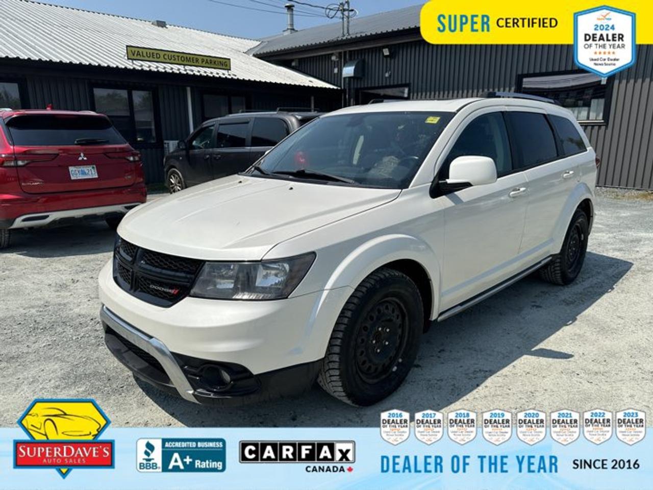 Discover a versatile, family-ready 2018 Dodge Journey Crossroad, Super Certified and offered at a Great Price. This low mileage SUV (111,194 km) blends comfort and capability with a potent 3.6L V6 and available AWD for confident traction in all conditions. Seating for seven makes it perfect for carpooling, weekend adventures, or hauling the crew in comfort.<br><p>THE SUPER DAVES ADVANTAGE</p> <p>BUY REMOTE - No need to visit the dealership. Through email, text, or a phone call, you can complete the purchase of your next vehicle all without leaving your house!</p> <p>DELIVERED TO YOUR DOOR - Your new car, delivered straight to your door! When buying your car with Super Daves, well arrange a fast and secure delivery. Just pick a time that works for you and well bring you your new wheels!</p> <p>PEACE OF MIND WARRANTY - Every vehicle we sell comes backed with a warranty so you can drive with confidence.</p> <p>EXTENDED COVERAGE - Get added protection on your new car and drive confidently with our selection of competitively priced extended warranties.</p> <p>WE ACCEPT TRADES - We&rsquo;ll accept your trade for top dollar! We&rsquo;ll assess your trade in with a few quick questions and offer a guaranteed value for your ride. We&rsquo;ll even come pick up your trade when we deliver your new car.</p> <p>SUPER CERTIFIED INSPECTION - Every vehicle undergoes an extensive 120 point inspection, that ensure you get a safe, high quality used vehicle every time.</p> <p>FREE CARFAX VEHICLE HISTORY REPORT - If youre buying used, its important to know your cars history. Thats why we provide a free vehicle history report that lists any accidents, prior defects, and other important information that may be useful to you in your decision.</p> <p>METICULOUSLY DETAILED &ndash; Buying used doesn&rsquo;t mean buying grubby. We want your car to shine and sparkle when it arrives to you. Our professional team of detailers will have your new-to-you ride looking new car fresh.</p> <p>(Please note that we make all attempt to verify equipment, trim levels, options, accessories, kilometers and price listed in our ads however we make no guarantees regarding the accuracy of these ads online. Features are populated by VIN decoder from manufacturers original specifications. Some equipment such as wheels and wheels sizes, along with other equipment or features may have changed or may not be present. We do not guarantee a vehicle manual, manuals can be typically found online in the rare event the vehicle does not have one. Please verify all listed information with our dealership in person before purchase. The sale price does not include any ongoing subscription based services such as Satellite Radio. Any software or hardware updates needed to run any of these systems would also be the responsibility of the client. All listed payments are OAC which means On Approved Credit and are estimated without taxes and fees as these may vary from deal to deal, taxes and fees are extra. As these payments are based off our lenders best offering they may be subject to change without notice. Please ensure this vehicle is ready to be viewed at the dealership by making an appointment with our sales staff. We cannot guarantee this vehicle will be on premises and ready for viewing unless and appointment has been made.)</p>