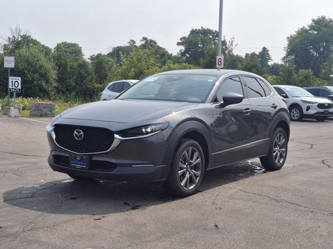 Come see this certified 2024 Mazda CX-30 GT AWD | Leather | Sunroof | Heated Seats + Steering | Bose Audio | Wireless Carplay | and More !. Its Automatic transmission and 2.5 L engine will keep you going. This Mazda CX-30 features the following options: Sunroof, Leather, Heated Steering Wheel, Bose Speaker System, Apple Car Play, Air Conditioning, Heated Seats, Tilt Steering Wheel, Steering Radio Controls, and Power Windows. Test drive this vehicle at Mark Wilsons Better Used Cars, 5055 Whitelaw Road, Guelph, ON N1H 6J4.MASSIVE SELECTION: 500+ vehicles in ONE LOCATION, all Live Market Priced for the best value!STRAIGHTFORWARD & TRANSPARENT PRICING: Our Advertised Price INCLUDES:Safety Certification! (No separate certification fee upcharge).FREE Carfax History Report!NO upcharge for paying cash!CONFIDENCE & PEACE OF MIND: 30-Day/3,000 km Warranty INCLUDED! Plus a 5-Day Exchange Privilege!*EASY FINANCING: Better-than-bank rates, $0 Down, and 3 Months No Payments available OAC. BAD CREDIT APPROVED HERE!WE BUY CARS: Get Top Dollar for your trade, or sell us your vehicle for CASH even if you dont buy ours!www.shopwilsons.comAn Honest, Transparent Buying Experience. Trusted in business since 1961!(Cash Prices Exclude HST and Licensing Fees only.)