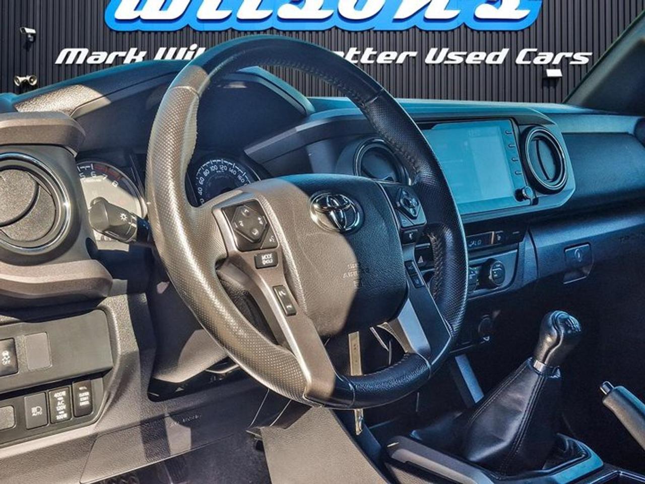 2022 Toyota Tacoma TRD Off-Road Access Cab 4X4 | 6-Speed Manual | V6 | Power Seat | CarPlay + Android | and More ! Photo