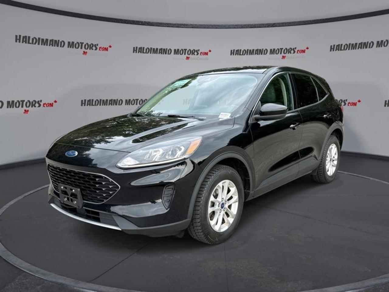 // ACCIDENT FREE!! //<br /><br />This 2020 Ford Escape SE AWD | No Accidents is a smart choice for drivers who want confidence, comfort, and everyday usefulness in one well-rounded SUV. Sold by Haldimand Motors Ltd. in Cayuga, this used Ford features a black exterior, grey interior, automatic transmission, and a fuel-friendly 1.5-litre gas engine.<br /><br />With 118,078 km, this 4-door 2020 Ford Escape SE AWD | No Accidents still offers the modern design and practical layout that made this generation so popular. Its all-wheel drive capability adds extra confidence in changing Ontario weather, while the clean accident-free history gives added peace of mind.<br /><br />FEATURES OF THE Escape SE AWD | No Accidents<br />   1.5-litre gas engine balances power and economy<br />   All-wheel drive adds year-round road confidence<br />   8-speed automatic supports smooth daily driving<br />   Black exterior gives a clean look<br /><br />ADVANCED SAFETY FEATURES<br />   Backup camera helps with parking and reversing<br />   Lane departure warning supports safer highway travel<br />   Blind spot monitor adds side awareness<br />   Side impact airbags add occupant protection<br /><br />PERFORMANCE AND EFFICIENCY<br />   1.5-litre engine delivers responsive everyday performance<br />   8-speed automatic shifts smoothly and efficiently<br />   All-wheel drive improves traction in poor weather<br />   Limited slip differential supports balanced road grip<br /><br />COMFORT AND CONVENIENCE<br />   Heated front seats help on cold mornings<br />   Drivers power seat adds easy adjustment<br />   Automatic climate control keeps cabin comfortable<br />   Cruise control supports relaxed highway driving<br /><br />TECHNONOLGY AND CONNECTIVITY<br />   Apple CarPlay integrates favourite smartphone apps<br />   Android Auto adds simple phone connectivity<br />   Bluetooth integration supports hands-free calling<br />   WiFi hotspot helps keep passengers connected<br /><br />CARGO SPACE<br />   Rear trunk access makes loading simple<br />   Four-door design helps passenger entry ease<br />   Flexible cargo area suits daily errands<br />   Useful space for groceries and gear<br /><br />AWARDS & RECOGNITIONS<br />   Top Safety Pick, Insurance Institute for Highway Safety, 2020<br /><br />WHAT OTHER OWNERS LIKE<br />   Easy-to-use infotainment and phone integration<br />   Comfortable ride for daily commuting<br />   Helpful safety features for busy roads<br />   Practical size with versatile cargo room<br /><br />Inside, this 2020 Ford Escape SE AWD | No Accidents offers a welcoming cabin with useful features that make daily driving easier. Heated front seats, front air conditioning, automatic climate control, power windows, power steering, and an adjustable steering wheel all work together to create a comfortable and user-friendly driving experience.<br /><br />Convenience is strong throughout this 2020 Ford Escape SE AWD | No Accidents. Push button start adds ease to every trip, while heated mirrors, electric mirrors, rear window defroster, automatic headlights, and automatic door locks help simplify your routine in all seasons. The rear spoiler and tinted windows also add a sporty, refined finish.<br /><br />Technology is another highlight in this 2020 Ford Escape SE AWD | No Accidents. Steering wheel audio controls keep key functions close at hand, while satellite radio expands your entertainment choices. Apple CarPlay, Android Auto, Bluetooth integration, and a WiFi hotspot help keep you connected whether you are commuting, travelling, or running errands around town.<br /><br />Safety remains a key strength in this 2020 Ford Escape SE AWD | No Accidents. It comes equipped with anti-lock braking system, stability control, tire pressure monitoring, child safety locks, driver airbag, passenger airbag, passenger airbag sensor, head side airbags, and illuminated vanity mirrors for both front occupants.<br /><br />For drivers shopping for a compact SUV that feels modern, capable, and practical, this 2020 Ford Escape SE AWD | No Accidents stands out with its accident-free history, all-wheel drive confidence, and strong list of everyday features. It is a well-equipped Ford ready for work, family use, and weekend travel alike.<br /><br />This 2020 Ford Escape SE AWD | No Accidents VIN is: 1FMCU9G64LUB83217.<br /><br />WHY CHOOSE US? <br /><br />Honest & Transparent Buying Experience: Weve been a trusted name in business since 1984.<br /><br />STRAIGHTFORWARD PRICING:<br />Our Advertised Price Includes:<br />>>Safety Certification (No separate fee!)<br />>>30-Day 100% Mechanical Warranty<br />>>FREE Carfax History Report.<br />>>No upcharge for paying cash.<br />(Prices Exclude HST and Licensing Fees only.)<br /><br />>>Browse 300+ vehicles all in ONE LOCATION<br /><br />EASY FINANCING: Great rates & open loans<br /><br />WE BUY CARS: Get Top Dollar for your trade-in, or sell us your vehicle for CASH! Even if you dont buy from us!<br /><br />STOP BY TODAY<br />Treat yourself - stop by Haldimand Motors Ltd. located at 42 Talbot St E, Cayuga, ON N0A 1E0 to make this car yours today!<br /><br />https://www.haldimandmotors.com/used/stock-460983.html