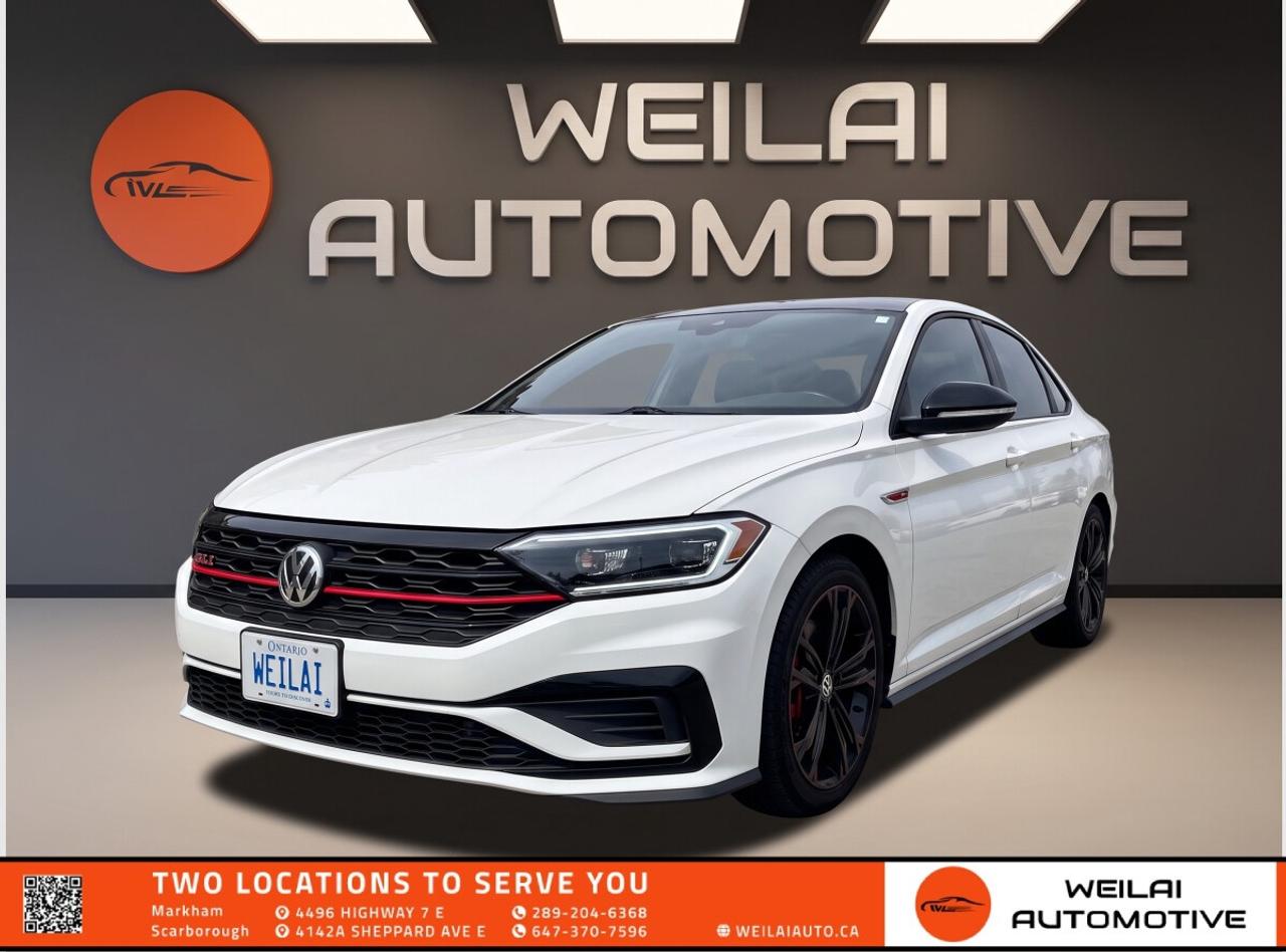 2.0L TSI Turbocharged Engine | BeatsAudio Premium Sound System | Rail 2 Rail Panoramic Sunroof | Heated and Ventilated Leather Seats | Volkswagen Digital Cockpit | Low credit? No credit? Established Credit? We accept ALL!!! - Contact Us Today!Test Drive the 2021 Volkswagen Jetta GLI Today! The 2021 Volkswagen Jetta GLI is the ultimate sport sedan for driving enthusiasts who refuse to compromise on everyday practicality. With its exhilarating turbocharged engine borrowed from the iconic Golf GTI, lowered sport-tuned suspension, and premium Canadian-market appointments, this GLI delivers thrilling track-inspired performance alongside sophisticated comfort and advanced technology. It is the perfect balance of European driving dynamics, head-turning style, and daily driving efficiency. <br/> Performance: ● Engine: 2.0L TSI Turbocharged 4-Cylinder ● Horsepower: 228 hp ● Torque: 258 lb-ft ● Transmission: 7-Speed DSG Automatic with Tiptronic ● Drivetrain: FWD <br/> Exterior: ● 18-inch Sevilla black alloy wheels with striking red brake calipers ● Rail 2 Rail power panoramic sunroof ● LED headlights, taillights, and daytime running lights ● Black Package styling including black mirror caps and rear lip spoiler ● Dual exhaust with chrome tips and lowered sport-tuned suspension <br/> Interior: ● Titan Black leather seating surfaces with red stitching ● Heated and ventilated front sport seats ● Heated rear outboard seats for maximum passenger comfort ● 10-colour customizable ambient interior lighting ● Leather-wrapped sport steering wheel with shift paddles <br/> Technology: ● BeatsAudio premium sound system with 8 speakers and subwoofer ● Wireless Apple CarPlay and Android Auto integration via App-Connect ● Volkswagen Digital Cockpit customizable instrument display ● Wireless smartphone charging pad ● 8-inch touchscreen infotainment system with Bluetooth and SiriusXM <br/> Safety: ● Front Assist with Autonomous Emergency Braking ● Blind Spot Monitor with Rear Traffic Alert ● Adaptive Cruise Control with Stop and Go ● Rearview camera system with dynamic guidelines ● Electronic Stability Control with VAQ limited-slip front differential lock <br/> Approximate Fuel Efficiency: ● City: 9.7 L/100 km ● Highway: 7.0 L/100 km! <br/> This incredibly sought-after 2021 Volkswagen Jetta GLI just arrived in our inventory and will not last long! High-performance sedans in this pristine condition are moving remarkably fast, so do not miss your chance to own this thrilling ride. Visit us at Weilai Automotive Inc. in Markham today to experience the unmatched performance and luxury for yourself. Call <br/> FINANCING: At Weilai Automotive Inc., were all about giving everyone a fair shot at owning a quality vehicle, no matter their credit history. Whether youre grappling with credit challenges or have a stellar credit record, we have financing options that cater to you. Your specific financing terms will depend on various factors, including your credit rating. For a personalized finance consultation, a signed consent form is needed. Reach out to schedule your appointment today. <br/> WEILAI CERTIFIED PRE-OWNED PROGRAM:* ● Full Detailing Package ● Comprehensive Certification Package ● Safety Certification ● Financing Available ● Extended Warranty Available ● Available for only $899 <br/> *Weilai Certified Pre-Owned Program includes: Full interior detailing, full exterior detailing, meticulous vehicle reconditioning. A comprehensive 60-point safety inspection with additional standards. For example, tire and brake treads must be a minimum of 3.5 mm which is 233% of the Ontario standard of 1.5 mm. Access to a large network of lenders to give you the best approval guaranteed. Option to extend the warranty for up to an additional 6 years for an additional fee. <br/> CARFAX REPORT: We believe in full transparency. All vehicles come with a FREE Carfax report. Please visit our listing on weilaiauto.ca or autotrader.ca to obtain your free Carfax report. <br/> CONTACT NOW: We welcome customers from all over the GTA, including Markham, Scarborough, Barrie, Stouffville, Toronto, Richmond Hill, East Gwillimbury, Aurora, North York, East York, Whitby, Brampton, and the surrounding area. Ready to take the next step? Book an appointment, get more info, or get in touch by calling 647-370-7596 or emailing us at scmanagers@weilaiauto.ca. <br/> FEE DISCLOSURE: Price does not include safety certification, HST, or licensing fees. Safety certification available, see the Weilai Certified Pre-Owned Program for details. <br/> FINANCE SPECIAL PRICE ONLY: Pricing is based on financing. The listed price includes a $1,000 finance rebate. Choosing an alternative payment method may disqualify this rebate. <br/> VEHICLE CONDITION: The vehicle has been inspected and reconditioned to a premium pre-owned condition and is ready to be test-driven. However, to comply with OMVICs disclosure requirements, please note that this unit is not currently drivable and not certified until it undergoes safety certification. <br/> DISCLAIMERS: Please note that these details are based on the typical specifications for a given year, make, and model, and actual features may vary for the specific VIN provided. The descriptions above and the contents on this vehicle detail page are generated using AI and VIN decoders, which may contain inaccuracies. They are intended for reference only and may not be entirely reliable. Always check the vehicles actual specifications and refer to the owners manual for the most precise and up-to-date information. While Weilai Automotive Inc. strives to provide accurate information, we will not be responsible for any mistakes made on this page. <br/>
