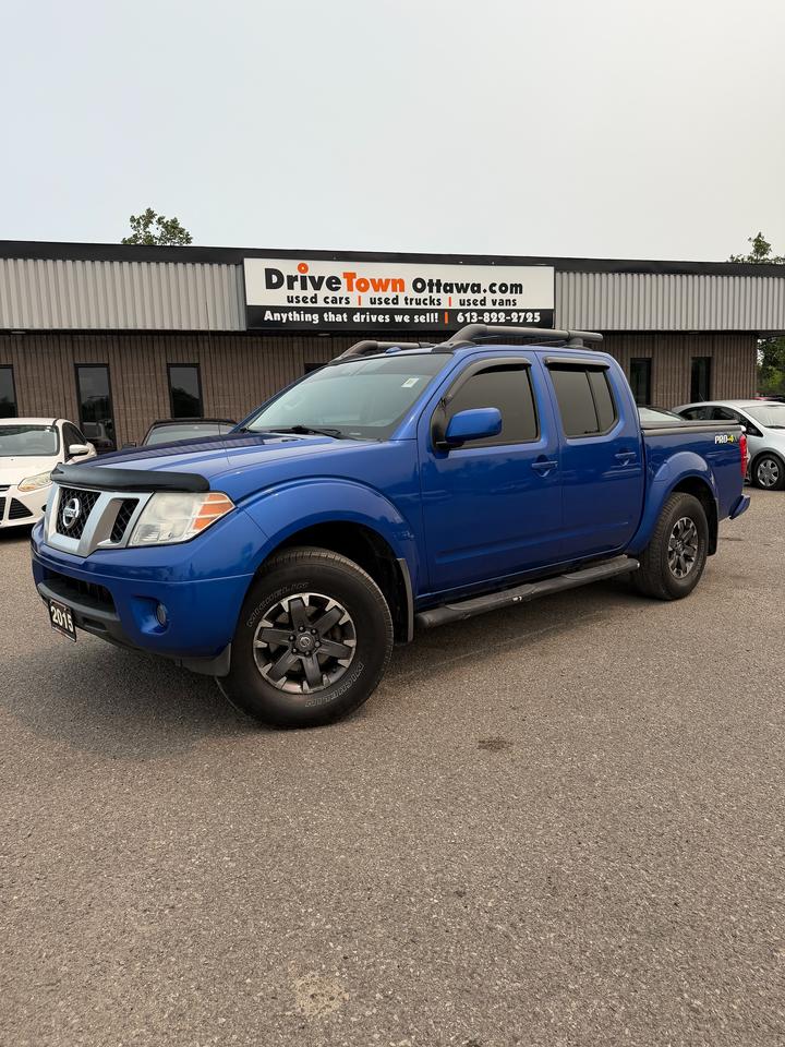<p>2015 NISSAN FRONTIER PRO-4X CREW CAB BLUE - 4WD, LEATHER & READY FOR ADVENTURE!</p><p>VERY CLEAN - SHARP LOOKING FRONTIER PRO-4X WITH A TOUGH LOOK, COMFORTABLE DRIVE AND GREAT EVERYDAY PRACTICALITY!</p><p>4WD + AUTOMATIC TRANSMISSION - BUILT FOR ALL-SEASON CONFIDENCE, WORK, TRAILS, CAMPING OR WEEKEND ADVENTURES!</p><p>PRO-4X TRIM WELL EQUIPPED WITH LEATHER INTERIOR, BACKUP CAMERA, BLUETOOTH, CRUISE CONTROL, POWER WINDOWS, POWER LOCKS & A COMFORTABLE CREW CAB INTERIOR!</p><p>SHORT WHEELBASE CREW CAB DESIGN GIVES YOU A GREAT BALANCE OF PRACTICAL SIZE, PASSENGER SPACE AND TRUCK CAPABILITY!</p><p>PERFECT FOR DAILY DRIVING, WORK, WINTER DRIVING, CAMPING, LIGHT OFF-ROAD USE OR ANYONE LOOKING FOR A CLEAN, CAPABLE & FUN MID-SIZE TRUCK!</p><p>EASY FINANCING AVAILABLE!</p><p>ADVERTISED PRICE IS OUR FINANCE PRICE.</p><p>DRIVETOWNOTTAWA.COM - COME VISIT US / VENEZ NOUS VISITER!</p><p>TAXES AND LICENSING EXTRA. SEE DRIVETOWNOTTAWA.COM FOR CASH PRICE. FINANCING CHARGES APPLY, INCLUDING BANK FEES, PPSA AND INTEREST. QUEBEC SAFETY FEE APPLICABLE.</p>