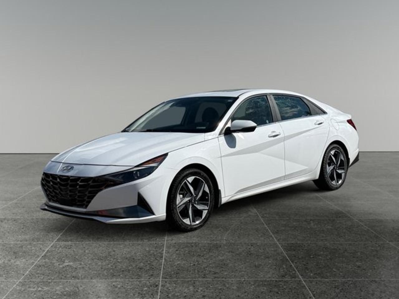 House of Cars Olympic Park An AMVIC licensed automotive retail dealer Location: 8525 Bowfort Rd. N.W Call: 587-356-1144  Stock #: 5463-6 Year: 2023 Make: Hyundai Model: Elantra Hybrid Luxury VIN: KMHLN4AJ1PU041975 KM: 91,497 Color: White Transmission: Automatic Drivetrain: FWD Body Style: Sedan  Key Features: Hybrid Powertrain Leather Seats Heated Front & Rear Seats Heated Steering Wheel Power Sunroof Adaptive Cruise Control Blind Spot Collision Avoidance Assist Lane Following Assist Navigation System Wireless Charging Pad Apple CarPlay & Android Auto Back Up Camera Bose Premium Audio System Dual Zone Climate Control  Additional Highlights: CARFAX Included Professionally Detailed 1000+ Vehicles In Stock  Visit House of Cars Olympic Park or call 587-356-1144 to schedule your test drive today!