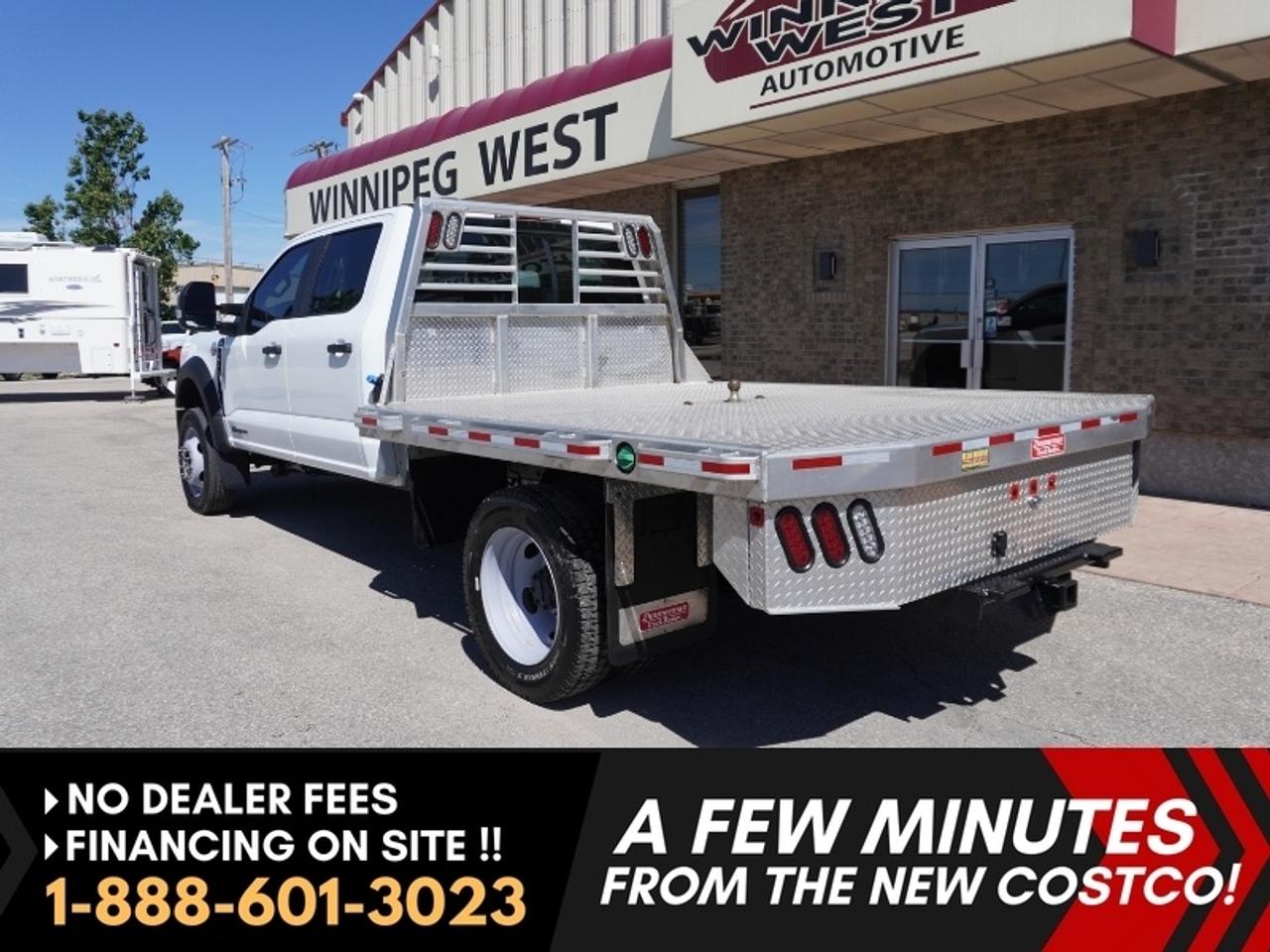 *** Dealer arranged financing on site! Quick, Simple,  no calls or waiting on bank appointments required!! Drive away today ***   NO ADMINISTRATION FEES!!2025 Ford F-550 Super Duty Dually ONLY 21,000 KMS!!!! Equipped with PREMIUM diamond-plate 9 ft aluminum flat deck complete with a built-in headache rack - - Quick release Gooseneck hitch - -  6.7L Power Stroke Turbo Charged V8 Diesel Engine - - TorqShift 10-speed automatic - - 8-in Infotainment system with Ford SYNC - - Bluetooth - - Apple CarPlay and Android Auto - 5G Wi-Fi hotspot capability - - Heated Mirrors - -  6 way auxiliary switches  - -  Towing mirrors with manual telescoping and integrated rear-facing turn signals - - Lane Keeping Assist System - - Cruise Control 

Classic Oxford White exterior. Interior in excellent condition. Spacious 6-passenger cabin. Foldable rear seats for added space. Front and back 

Excellent history. Clean. No damages. Zero Accidents. Like new with only 21,00 KMS!  Perfect for heavy hauling! A great addition to your fleet.

Features
- 10-speed TorqShift automatic transmission
-  330 horsepower and an impressive 825 lb-ft of torque.
- AdvanceTrac with Roll Stability Control (RSC) 
- SYNC 4 infotainment system
- 8-inch Touchscreen
- Voice recognition
- Apple CarPlay and Android Auto
- Bluetooth
- 5G Wi-Fi hotspot capability
- 911 Assist
- Power windows
- Power mirrors
- Air conditioning
- Upfitter switches
- Manual tilt/telescoping steering
- Cruise control, 
- Dash-mounted 120-volt/400-watt power outlet
- Emergency brake assist
- Drive mode select
- Steering wheel controls
- Lane Keeping Assist System
- Cruise Control
- Towing mirrors w/ manual telescoping
- Heated mirrors
- Integrated rear-facing turn signalsComes with a Manitoba Safety Certification, and we have many Extended Powertrain warranties available on your vehicle purchase up to 10-year coverage (on eligible vehicles see dealer for details). Financing on site with Zero down financing OAC. Trades accepted. View at Winnipeg West Automotive Group, 5195 Portage Ave. (only a couple of minutes past the new Costco) Dealer permit # 6007, Call now 1(888) 601-3023. This Car is located in Winnipeg Manitoba,  however we can have it shipped anywhere in North America relatively inexpensively.