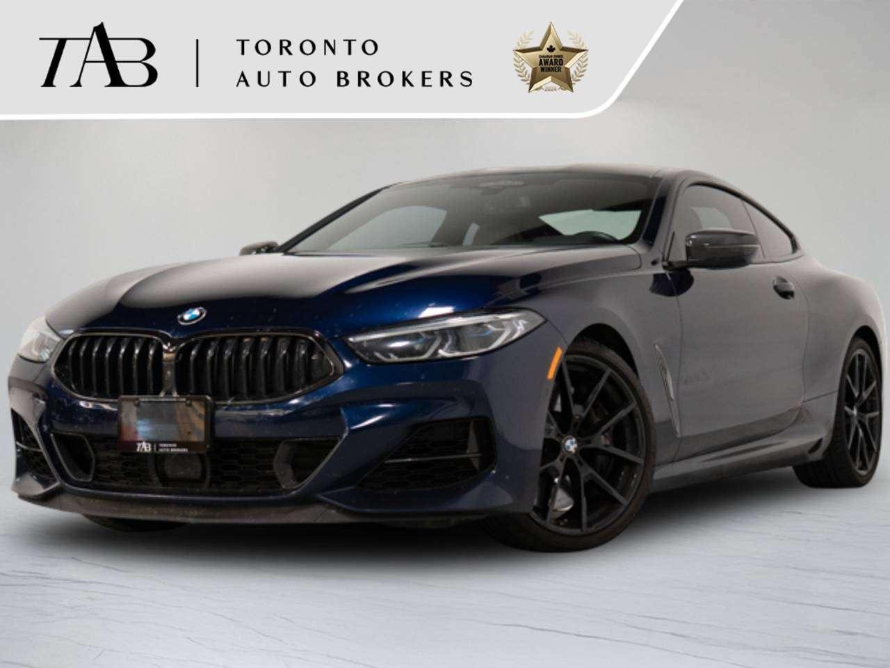 This 2022 BMW 8 Series M850i xDrive is a local Ontario vehicle with a clean Carfax report and the remaining manufacturer warranty valid until August 9, 2026 or 80,000 km, whichever comes first. Combining breathtaking performance with grand touring luxury, this M850i xDrive is powered by a 4.4L BMW TwinPower Turbo V8 engine producing 523 horsepower, paired with BMWs intelligent xDrive all-wheel drive system and an 8-speed Sport Automatic transmission. Equipped with a lightweight Carbon Fibre Roof, Premium Package, and striking 20-inch alloy wheels, this flagship coupe delivers exceptional performance, refined comfort, and unmistakable presence on the road.

Key Features:

4.4L BMW TwinPower Turbo V8 Engine (523 HP)
8-Speed Sport Automatic Transmission
BMW xDrive Intelligent All-Wheel Drive
Local Ontario Vehicle
Clean Carfax Report
Carbon Fibre Roof
Premium Package
20-Inch Alloy Wheels
Adaptive M Suspension
M Sport Brakes
Heated Front Seats
Heated Steering Wheel
Power Adjustable Front Sport Seats with Memory

NOW OFFERING 3 MONTH DEFERRED FINANCING PAYMENTS ON APPROVED CREDIT. 

WE OFFER THE BEST FINANCE RATES, AND DONT CHARGE ANY FINANCING FEE

Looking for a top-rated pre-owned luxury car dealership in the GTA? Look no further than Toronto Auto Brokers (TAB)! Were proud to have won multiple awards, including the 2024 AutoTrader Best Priced Dealer, the 2026 Best in Business award, the 2025 CarGurus Award, the 2026 Top Choice Award, the 2026 Dealer Rater Consumer Satisfaction Award, the 2026 Canadian Choice Award, the 2026 Three Best Rated Dealer Award, and many more!

With 30 years of experience serving the Greater Toronto Area, TAB is a respected and trusted name in the pre-owned luxury car industry. Our 30,000 sq.Ft indoor showroom is home to a wide range of luxury vehicles from top brands like BMW, Mercedes-Benz, Audi, Porsche, Land Rover, Jaguar, Aston Martin, Bentley, Maserati, and more. And we dont just serve the GTA, were proud to offer our services to all cities in Canada, including Vancouver, Montreal, Calgary, Edmonton, Winnipeg, Saskatchewan, Halifax, and more.

At TAB, were committed to providing a no-pressure environment and honest work ethics. As a family-owned and operated business, we treat every customer like family and ensure that every interaction is a positive one. Come experience the TAB Lifestyle at its truest form, luxury car buying has never been more enjoyable and exciting!

We offer a variety of services to make your purchase experience as easy and stress-free as possible. From competitive and simple financing and leasing options to extended warranties, aftermarket services, and full history reports on every vehicle, we have everything you need to make an informed decision. We welcome every trade, even if youre just looking to sell your car without buying, and when it comes to financing or leasing, we offer same day approvals, with access to over 50 lenders, including all of the banks in Canada. Feel free to check out your own Equifax credit score without affecting your credit score, simply click on the Equifax tab above and see if you qualify.


Call us today or visit our website to learn more about our inventory and services. And remember, all prices exclude applicable taxes and licensing, and vehicles can be certified at an additional cost of $999.