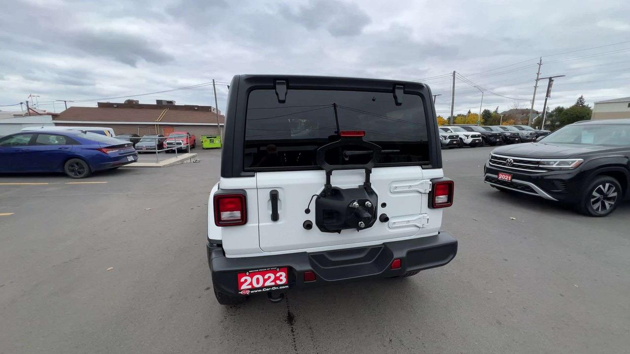 2023 Jeep Wrangler SAHARA 4X4 | 4-DR | HTD SEATS | CARPLAY | HARD TOP Photo