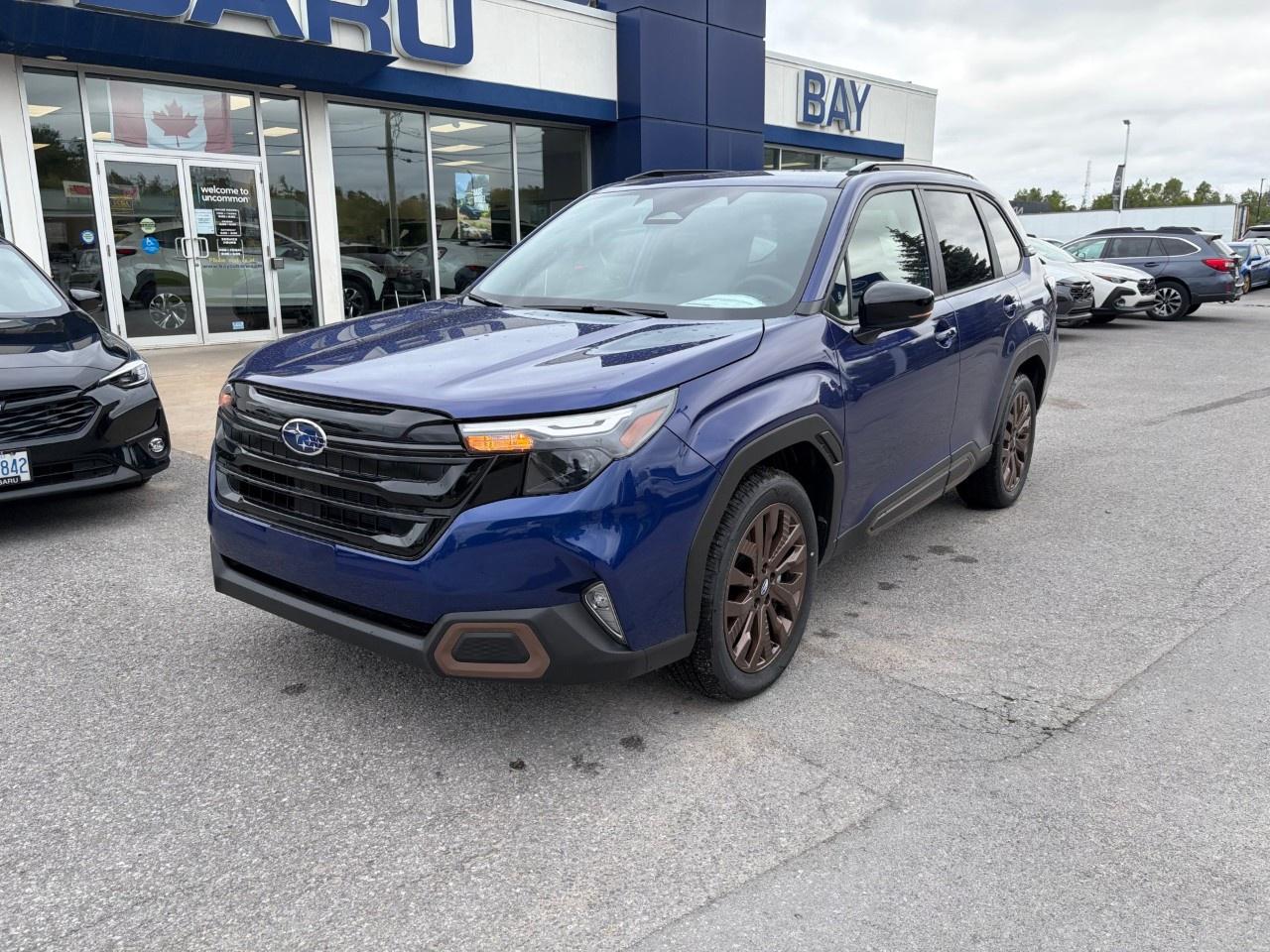 <p>Price includes all fees, and the following installed accessories: Security Package, Rear Bumper Cover and Wheel Lock Kit, HST and licensing fees are extra.</p><p> </p><p>Use this link to view the brochure for the Forester – <a target=_blank rel=noopener noreferrer nofollow href=https://joom.ag/Q6vd>https://joom.ag/Q6vd</a>.</p><p> </p><p>Features of the Forester Sport include Subaru Symmetrical Full-Time AWD with dual-function X-MODE® and SI-DRIVE® (2-mode with Sport#), Sport-tuned suspension (Stablex dampers), Soft-touch all-weather seats, a large power-sliding sunroof with sunshade, 19-inch aluminum alloy wheels, 15-spoke, bronze finish, and 11.6-inch tablet-style touch screen infotainment system: Harman Kardon® audio system, SiriusXM® capability (subscription required), wireless Apple CarPlay® and Android Auto™ functionality.</p><p> </p><p>Call us today to book your test drive, and, while you are visiting, ask our Sales Team about Subaru’s lease and finance options.</p><p> </p><p>All new Subaru vehicles come with a new vehicle limited warranty. Our warranties include 3 years unlimited mileage of roadside assistance, 3 years or 60,000 kms (which ever comes first) of comprehensive coverage as well as coverage on the powertrain and major components for 5 years or 100,000 kms, which ever comes first.</p><p> </p><p>Ask our sales team about our extended warranty coverage that is available and can be tailored to meet your driving needs.</p>