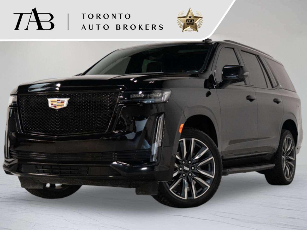 This 2021 Cadillac Escalade Sport is a local ontario vehicle with a clean carfax report. Featuring the powerful 600 package, 7-passenger seating, Driver Assist Package, and 22-inch wheels, this Escalade delivers premium comfort, advanced technology, and a bold design perfect for any occasion. 

Key features Include:

Sport Trim Package
Super Cruise Hands-Free Driving Technology
Driver Assist Package
22-Inch Alloy Wheels
AKG&reg; Studio 19-Speaker Audio System
38-Inch Curved OLED Display
Augmented Reality Navigation
Power Panoramic Sunroof
Leather-Appointed Heated & Ventilated Seats
7-Passenger Seating
Magnetic Ride Control & Air Ride Adaptive Suspension
HD Surround Vision

NOW OFFERING 3 MONTH DEFERRED FINANCING PAYMENTS ON APPROVED CREDIT. 

WE OFFER THE BEST FINANCE RATES, AND DONT CHARGE ANY FINANCING FEE

Looking for a top-rated pre-owned luxury car dealership in the GTA? Look no further than Toronto Auto Brokers (TAB)! Were proud to have won multiple awards, including the 2024 AutoTrader Best Priced Dealer, the 2026 Best in Business award, the 2025 CarGurus Award, the 2026 Top Choice Award, the 2026 Dealer Rater Consumer Satisfaction Award, the 2026 Canadian Choice Award, the 2026 Three Best Rated Dealer Award, and many more!

With 30 years of experience serving the Greater Toronto Area, TAB is a respected and trusted name in the pre-owned luxury car industry. Our 30,000 sq.Ft indoor showroom is home to a wide range of luxury vehicles from top brands like BMW, Mercedes-Benz, Audi, Porsche, Land Rover, Jaguar, Aston Martin, Bentley, Maserati, and more. And we dont just serve the GTA, were proud to offer our services to all cities in Canada, including Vancouver, Montreal, Calgary, Edmonton, Winnipeg, Saskatchewan, Halifax, and more.

At TAB, were committed to providing a no-pressure environment and honest work ethics. As a family-owned and operated business, we treat every customer like family and ensure that every interaction is a positive one. Come experience the TAB Lifestyle at its truest form, luxury car buying has never been more enjoyable and exciting!

We offer a variety of services to make your purchase experience as easy and stress-free as possible. From competitive and simple financing and leasing options to extended warranties, aftermarket services, and full history reports on every vehicle, we have everything you need to make an informed decision. We welcome every trade, even if youre just looking to sell your car without buying, and when it comes to financing or leasing, we offer same day approvals, with access to over 50 lenders, including all of the banks in Canada. Feel free to check out your own Equifax credit score without affecting your credit score, simply click on the Equifax tab above and see if you qualify.


Call us today or visit our website to learn more about our inventory and services. And remember, all prices exclude applicable taxes and licensing, and vehicles can be certified at an additional cost of $999.