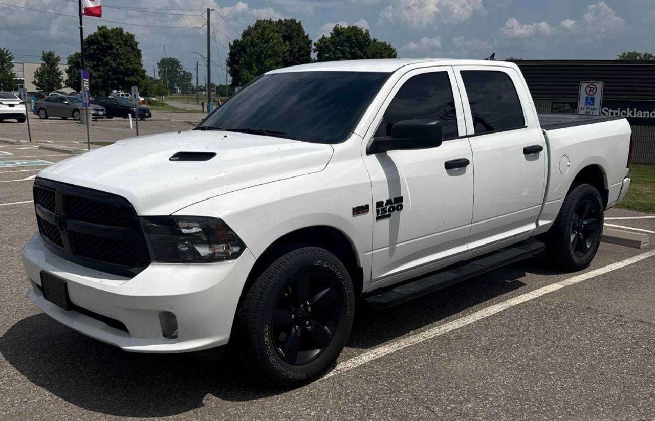 Express, HEMI V8 Engine, 4x4 Off-Road Capability, Crew Cab Configuration, Tow Package

Ever wonder what it feels like to have serious muscle at your command without sacrificing everyday usability? The 5.7L HEMI V8 delivers that unmistakable rumble and the kind of torque that makes hauling and towing feel effortless, while the Crew Cab gives you room for the whole crew in comfort. Built on RAMs legendary truck heritage, the 1500 Classic proves you dont need to spend top dollar to get a truck thats ready for anything.

Available now at Car Central  Barries largest used car dealership and the most trusted in Simcoe County. Rated 4.9 stars on Google with over 1,200 five-star reviews, weve earned our reputation by making car buying simple, best price upfront, no haggling, no pressure. With 200+ vehicles in stock and a team that puts you first, come see why more people choose Car Central than anywhere else in the region.

CARFAX: Free Carfax report on all our listing. Just go on our website and click view Carfax report.


CERTIFICATION: Have your new pre-owned vehicle certified at Car Central! We offer a full safety inspection exceeding industry standards including oil change, and professional detailing prior to delivery. Vehicles are not drivable, if not certified and not e-tested, certification package is available for $749. All trade-ins are welcome. Taxes, licensing are extra.


PRICE: We believe everyone deserves to get the best price possible on their new pre-owned vehicle without having to go through uncomfortable negotiations. Our Market Value Pricing (MVP) allows you to buy with confidence. We do this by constantly monitoring the market and adjusting our prices below the market average you can buy confidently knowing you are getting the best price possible! No haggle pricing. No pressure. Why pay more somewhere else. **CASH PRICE** will be an additional $1750 and it will include 1 Year or 15,000 kms Powertrain warranty. 


SERVICE: Schedule an appointment with Car Central Service Centre to bring your vehicle in for all its needs. Simply click on the link below and book your appointment. Our licensed technicians and repair facility offer the highest quality services at the most competitive prices. All work is manufacturer warranty approved and comes with 2-year parts and labour warranty. Start saving hundreds of dollars by servicing your vehicle with Car Central. Call us at 705-503-5000 or follow this link to book an appointment today! https://www.carcentral.ca/contact-us/


WARRANTY: This vehicle qualifies for an extended warranty with different terms and coverages available. Dont forget to ask for help choosing the right one for you.


FINANCING: No credit? New to the country? Bankruptcy? Consumer proposal? Collections? You dont need good credit to finance a vehicle. Bad credit is usually good enough. Give our finance and credit experts a chance to get you approved and start rebuilding credit today! On the spot financing, instant approvals, and no payments for 6 months is also available O.A.C!


Any vehicle stock number starting with Letter R are Previous daily Rental.


With over 30 years of experience, Car Central is a proud family-owned business and a trusted member of the UCDA. Our mission is to offer not only the best prices but also high-quality, reliable vehicles and an exceptional customer experience. We believe in making your car buying journey stress-free, with absolutely no pressurejust honest service you can rely on."