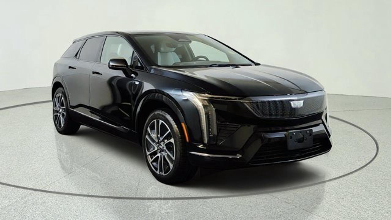 The 2027 Cadillac OPTIQ Sport delivers a refined all-electric luxury SUV experience with bold styling, responsive dual-motor all-wheel drive, and impressive everyday versatility. Its range of 482 km on a full charge will impress. Its sleek exterior is complemented by a premium cabin featuring advanced technology, including a large curved LED display with Google built-in, wireless Apple CarPlay and Android Auto compatibility, and a premium audio system for an immersive driving experience. Designed with comfort in mind, the OPTIQ Sport offers spacious seating, high-quality materials, and a generous cargo area, making it ideal for both daily commutes and weekend getaways. Advanced driver assistance features, including Cadillacs latest safety technologies and available Super Cruise hands-free driving capability, help provide confidence and convenience on the road. Combining luxury, innovative EV performance, and cutting-edge technology, the 2027 Cadillac OPTIQ Sport is an outstanding choice for drivers seeking a premium electric SUV.