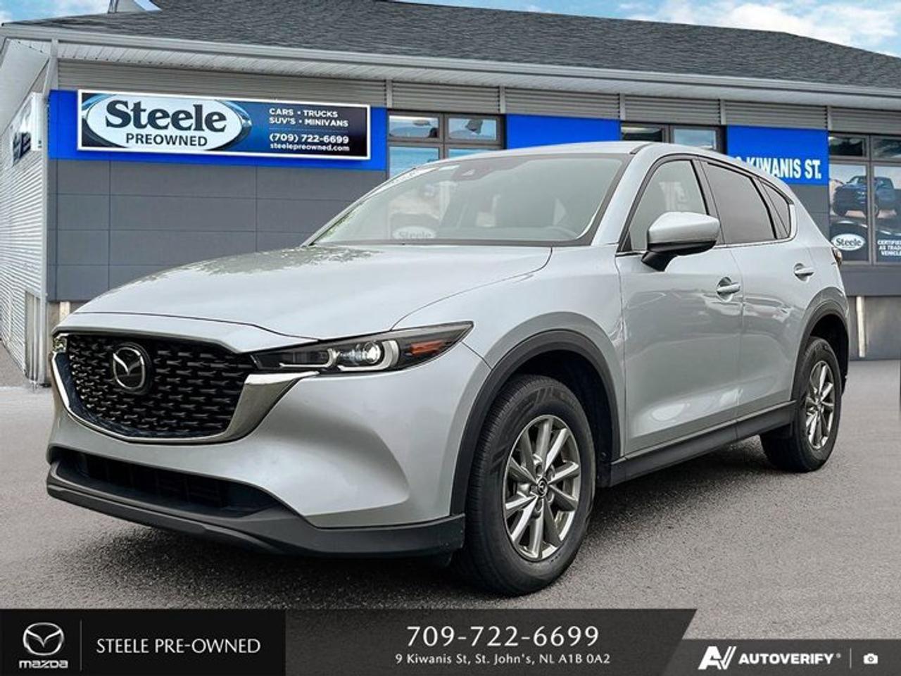 This Used 2022 Mazda CX-5 GS is a fantastic option for anyone in the market for a reliable and stylish SUV. With an odometer reading of 85,330 kilometers, this vehicle has plenty of life left to offer. The gasoline engine is a Regular Unleaded I-4 2.5 L/152, providing a great balance of power and fuel efficiency with city KM/L at 10 and highway KM/L at 8. The AWD 6-Speed Automatic transmission ensures smooth and responsive handling in any driving conditions. One of the standout features of this Mazda CX-5 GS is its impressive audio system, including an AM/FM/HD Audio System with 6 speakers, a 10.25 full-color center display with Mazda Connect Infotainment system, Apple CarPlay and Android Auto compatibility, Bluetooth connectivity with audio profile, and SMS text message functionality. With all these options included in the vehicle, you can enjoy your favorite music or podcasts on the go while staying connected to your smartphone for navigation or communication needs. This well-maintained SUV is ready to provide its next owner with years of comfortable and enjoyable driving experiences.