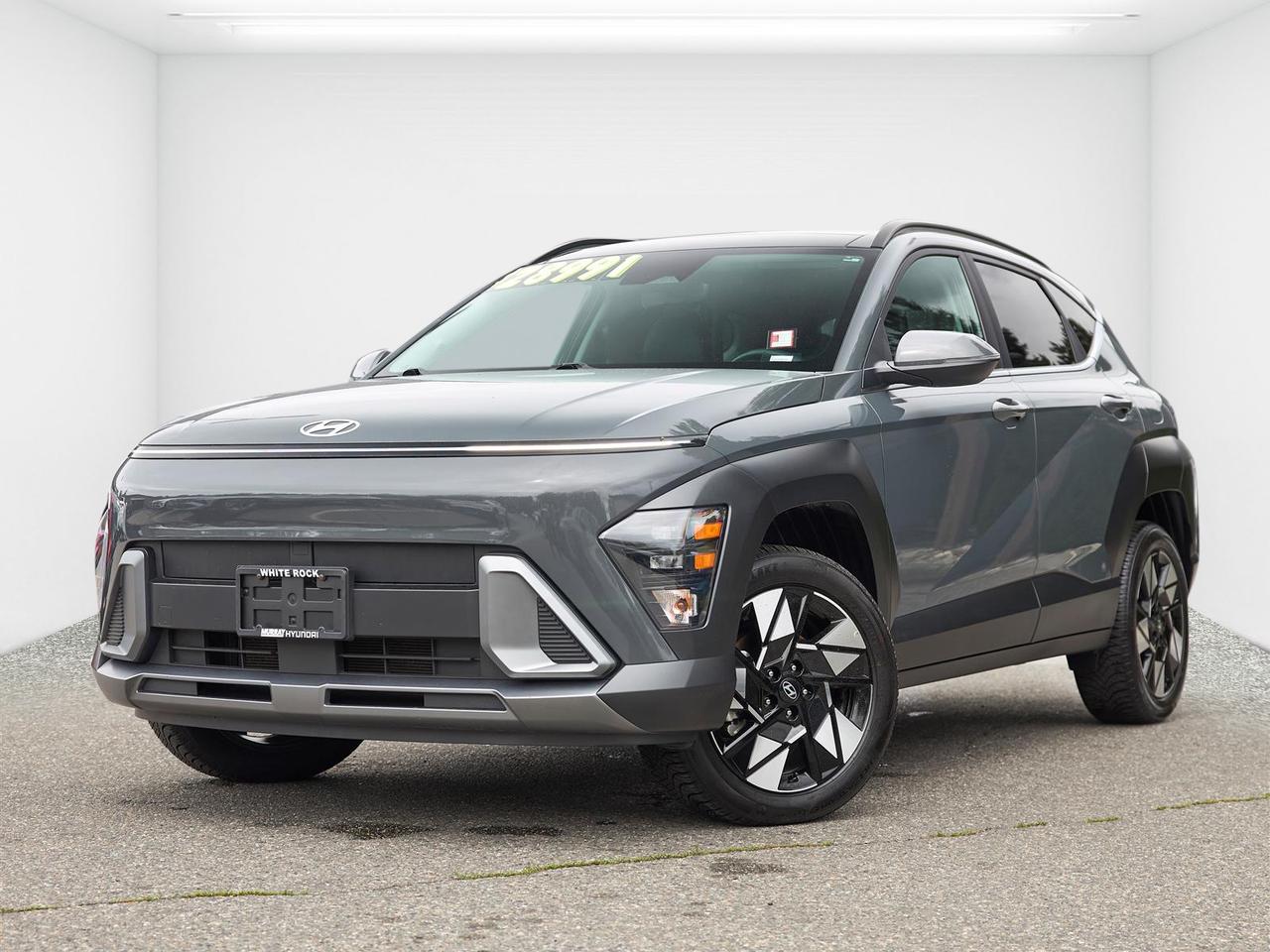 No Accidents | AWD | Preferred Trim | Apple CarPlay & Android Auto | Heated Seats | Heated Steering Wheel | Backup Camera | Hyundai Safety Technology<br><br>2025 Hyundai Kona Preferred AWD<br><br>This 2025 Hyundai Kona Preferred AWD is now available at White Rock Hyundai, offering modern styling, everyday efficiency, and confident all-wheel drive capability in a compact SUV. Finished in Ecotronic Gray Pearl and powered by a 2.0L 4-cylinder engine paired with a CVT, this Kona delivers smooth, easy driving for commuting through White Rock, South Surrey, Surrey, Delta, Langley, and Vancouver.<br><br>With only 34,800 kilometres and no accidents reported, this Hyundai Kona Preferred stands out as a smart choice for drivers looking for a newer used SUV with comfort, value, and year-round confidence. Well-equipped with features such as Apple CarPlay, Android Auto, heated seats, heated steering wheel, backup camera, Bluetooth, and Hyundai safety technology, it offers the everyday convenience todays drivers want. If youre searching for a used Hyundai Kona for sale in White Rock, this low kilometre Preferred AWD is a great option.<br><br>Why Buy From White Rock Hyundai?<br>* 7x Hyundai Presidents Award of Merit Winner<br>* 3x Consumer Choice Award for Business Excellence<br>* AutoTrader Dealer of the Year<br><br>M-Promise Certified Pre-Owned ($995 value) includes:<br>* 30-day / 2,000 km Exchange Program<br>* 3-day / 300 km Money Back Guarantee<br>* Comprehensive 144-Point Mechanical Inspection<br>* Full Synthetic Oil Change<br>* BC Verified CARFAX<br>* Minimum 6 Month Powertrain Warranty<br><br>Hyundai Certified Pre-Owned Benefits<br>* 144-Point Inspection<br>* CARFAX Vehicle History Report<br>* Transferable 6-Year / 120,000 km Powertrain Limited Warranty (This is an additional 1 year/20, 000 km beyond the original factory warranty)<br>* 1 Year 24-Hour Roadside Assistance<br>* Preferred Financing Rates Available OAC<br>* 30-Day / 2,000 km Exchange Privilege<br><br>Buy with confidence at White Rock Hyundai. Our vehicles are priced competitively based on market demand, condition, and kilometres to give our customers a transparent and hassle-free buying experience.<br><br>Visit White Rock Hyundai today to test drive this 2025 Hyundai Kona Preferred AWD. We proudly serve drivers in White Rock, South Surrey, Surrey, Delta, Langley, and Vancouver with quality pre-owned vehicles and a professional, no-pressure experience.<br><br>Contact our team today to confirm availability, explore financing options, and reserve this vehicle.<br><br>*Advertised price reflects the financing purchase price. Cash purchase price is $1,000 higher than the advertised financing price. Financing is subject to approved credit. All vehicle purchases are subject to a $799 administration fee. Dealer #31129.