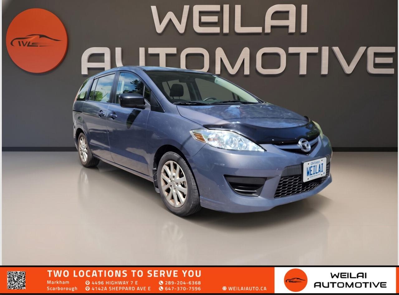 6-Passenger Seating Capacity | Power Sliding Glass Moonroof | Xenon HID Headlights | Bluetooth Hands-Free Capability | 17-Inch Alloy Wheels | Low credit? No credit? Established Credit? We accept ALL!!! - Contact Us Today!Test Drive the 2010 MAZDA Mazda5 Wagon GT Today! The 2010 Mazda5 GT is the perfect multi-activity vehicle for Canadian families who want the practicality of a minivan without the bulky size. Offering dual sliding rear doors, flexible three-row seating, and sporty handling dynamics, this compact people-mover is incredibly easy to maneuver and park in tight city spaces. As a top-tier GT trim, it comes loaded with premium features, ensuring every journey is comfortable, convenient, and enjoyable for all passengers. <br/> PerformanceEngine: 2.3L DOHC 16-valve 4-cylinder <br/> Horsepower: 153 hp <br/> Torque: 148 lb-ft <br/> Transmission: 5-speed automatic transmission with manual shift mode <br/> Drivetrain: FWD <br/> Exterior17-inch alloy wheels that enhance both styling and road grip <br/> Xenon High-Intensity-Discharge (HID) headlights for superior nighttime visibility <br/> Power sliding glass moonroof with interior sunshade <br/> Rain-sensing windshield wipers for automatic weather adaptation <br/> Dual sliding rear doors for effortless access in tight parking spots <br/> Interior6-passenger seating capacity with a 50/50 split fold-down third row <br/> Automatic climate control with rear passenger controls <br/> Heated front seats to keep you warm during Canadian winters <br/> Leather-wrapped steering wheel and shift knob for a premium feel <br/> Power windows with a driver one-touch down/up feature <br/> TechnologyBluetooth hands-free phone and audio capability <br/> AM/FM/CD/MP3 compatible audio system <br/> Steering-wheel-mounted audio and cruise controls <br/> Auxiliary audio input jack for connecting external devices <br/> SiriusXM satellite radio compatibility <br/> SafetyDual front airbags, dual front side airbags, and side curtain airbags for all three rows <br/> Anti-lock Brake System (ABS) with Electronic Brake Force Distribution (EBFD) <br/> Dynamic Stability Control (DSC) with Traction Control System (TCS) <br/> Tire Pressure Monitoring System (TPMS) <br/> Anti-theft alarm system and engine immobilizer <br/> Approximate Fuel EfficiencyCity: 9.9 L/100 km <br/> Highway: 7.2 L/100 km! <br/> This 2010 Mazda5 GT is a rare find in our current inventory and is priced to move quickly! Compact family vehicles with this level of versatility and premium GT features are in high demand across the Canadian market and rarely stay on our lot for long. Do not miss your chance to own this incredibly practical and fun-to-drive wagon. Visit Weilai Automotive Inc. in Markham today for a test drive before it is gone! <br/> Financing and Credit OptionsWeilai Automotive Inc. is committed to assisting customers with all types of credit backgrounds. Financing terms, including rates and options, will vary based on credit history and other factors. To protect your privacy, a signed consent form is required to review your financing options. Please contact us to schedule an appointment at your earliest convenience. <br/> Pricing, Taxes, and Additional FeesPrices do not include HST or licensing fees. A free Carfax report is available on our website at weilaiauto.ca. We serve customers across the GTA, including but not limited to Markham, Scarborough, Barrie, Stouffville, Toronto, Richmond Hill, East Gwillimbury, Aurora, North York, East York, Whitby, and Brampton. <br/> Contact UsTo book an appointment, request more information, or discuss financing, please call 647-370-7596 or email info@weilaiauto.ca. We highly recommend scheduling a visit so you can inspect and test-drive the vehicle in person. <br/> “As-Is” Vehicle ConditionThis vehicle is sold “as is.” We have not performed a mechanical inspection nor provided a safety certificate, and we cannot determine what may be required for it to meet safety standards. Although the original owner used this vehicle daily and it appears to be in good condition, buyers are strongly encouraged to inspect and test-drive the vehicle prior to purchase. <br/> OMVIC Disclosure for As-Is Vehicles“This vehicle is being sold ‘as is,’ unfit, not e-tested, and is not represented as being in road-worthy condition, mechanically sound, or maintained at any guaranteed level of quality. The vehicle may not be fit for use as a means of transportation and may require substantial repairs at the purchaser’s expense. It may not be possible to register the vehicle to be driven in its current condition.” <br/> Although this wording may seem strict, it is a standard industry disclaimer required by OMVIC. From our observations, the vehicle appears to be in good condition, but it is sold without any guarantees or warranties. <br/> <br/> <br/> Disclaimer: The descriptions above and the contents on this vehicle detail page are generated by AI and other tools (such as a VIN decoder) which may contain inaccuracies or errors. They are provided for reference only and may not be entirely reliable. While we make every effort to provide accurate information, we strongly recommend verifying all details by inspecting the actual vehicle and reviewing its owner’s manual. <br/>