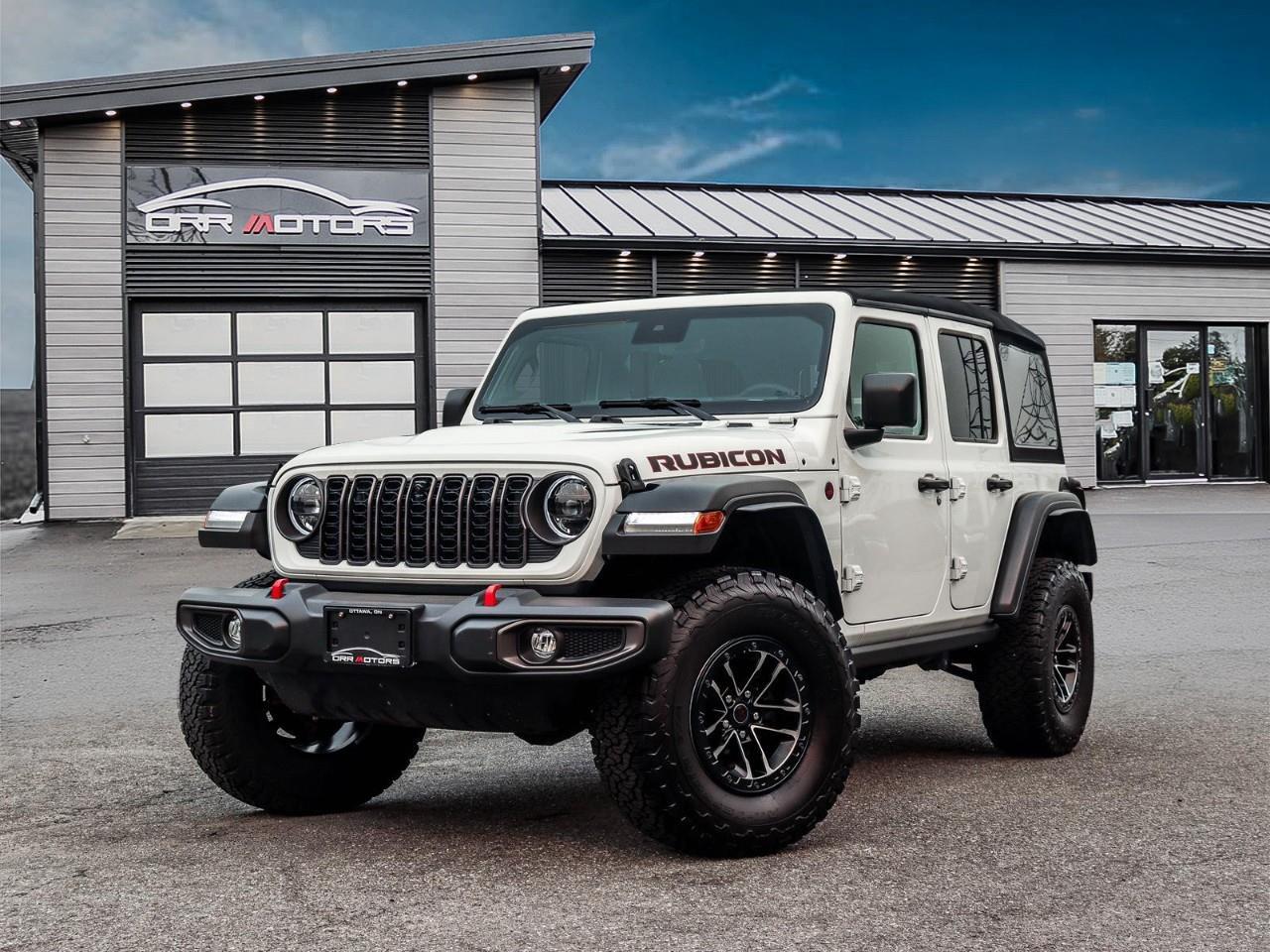 <p>2024 Jeep Wrangler Rubicon — Xtreme 35" Package, Off-Road Ready, for Sale in Ottawa, ON</p><p>Available now at Orr Motors - The Trusted Used Car Dealer in Ottawa Since 1962.</p><p>The 2024 Jeep Wrangler Rubicon is the benchmark for serious off-road capability — and this one arrives with the Xtreme 35" Tire Package, Technology Group, and Convenience Group, putting it at the top of the Rubicon lineup for Ottawa adventurers and off-road enthusiasts in Stittsville and beyond.</p><p>The 3.6L Pentastar V6 delivers 285 hp and 260 lb-ft of torque, channelled through an 8-speed automatic transmission and Rock-Trac part-time 4WD with a 4:1 low-range ratio. Add Tru-Lok locking differentials, a 4.10 rear axle, five skid plates, and 35" factory all-terrain tires — and you have a Wrangler built to go anywhere. Take on every trail and every season with confidence — contact Orr Motors today to book your test drive.</p><p><strong>Key Features:</strong> - 3.6L Pentastar V6 — 285 hp / 260 lb-ft - 8-Speed Automatic | Rock-Trac Part-Time 4WD (4:1 low range) - Tru-Lok front & rear locking differentials - Xtreme 35" Tire Package — 35" all-terrain tires, aluminum wheels, 4.10 axle - 5 skid plates - Technology Group — navigation system, premium sound system, HD Radio, satellite radio - Convenience Group — heated front seats, heated steering wheel, universal garage door opener - Apple CarPlay & Android Auto - Backup camera - Tow hitch - Convertible soft top with rollover protection bars - Keyless entry and push-button start - Dual 12V power outlets - LED headlights and daytime running lights - Privacy glass</p><p><strong>Fuel Economy (NRCan — 3.6L V6 / 8AT 4WD):</strong> City 12.8 · Highway 10.4 · Combined 11.7 L/100km</p><p><strong>Additional Highlights:</strong> Fully Certified & Safety Inspected Financing Available for All Credit Types Extended Warranty Options Available</p><p><strong>Why Buy from Orr Motors Ottawa:</strong> Family-Owned & Operated Dealership Since 1962 Certified & Safety-Inspected Vehicles Competitive Financing Options for All Credit Types Extended Warranty Coverage Available Serving Ottawa, Kanata, Stittsville & Nepean</p><p>Visit us at Orr Motors — 6230 Hazeldean Rd, Ottawa</p><p>Call: 613-836-3333 | orrmotors.com</p> <br /> <br /> <br /> **Advertised price is for finance purchase. <br /> *Every reasonable effort is made to ensure the accuracy of the information listed above. Vehicle pricing, incentives, options (including standard equipment), and technical specifications listed is for the Year, Make and Model of the vehicle, and may not match the exact vehicle displayed. Please confirm with a sales representative the accuracy of this information.