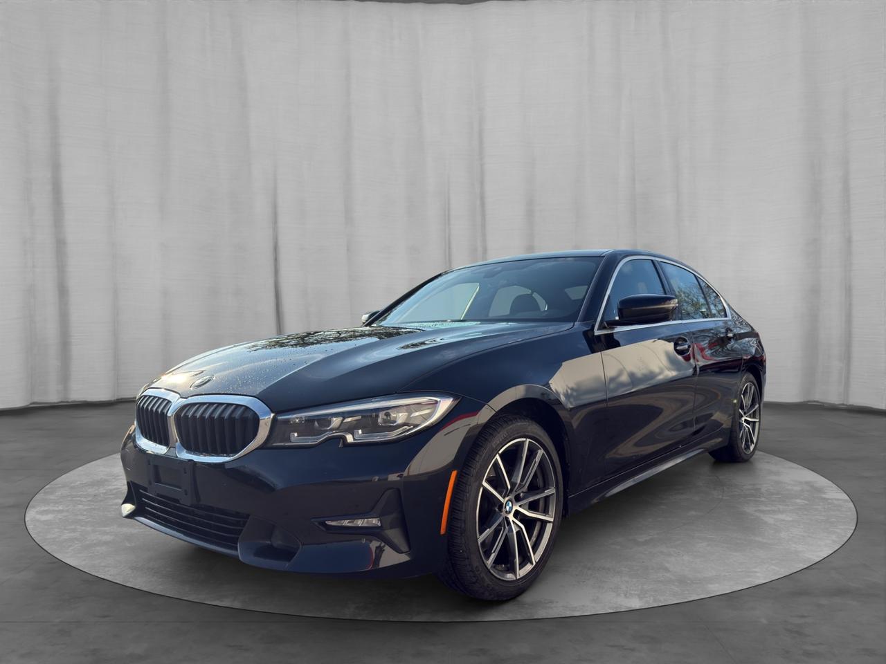 <h2><span><span>&nbsp;</span><strong>2020 BMW 330i xDrive  AWD | Remote Start | Wireless CarPlay | Premium Tech</strong></span></h2><p>The 2020 BMW 330i xDrive delivers a refined blend of luxury, performance, and advanced technology. With its turbocharged engine, intelligent all-wheel drive system, and upgraded connectivity features, this 3 Series offers a smooth yet engaging driving experience in all conditions.</p><hr><h3><span><span>&nbsp;</span><strong>Performance & Driving Experience</strong></span></h3><ul><li><p><strong>2.0L Turbocharged 4-Cylinder Engine</strong></p></li><li><p>8-Speed Automatic Transmission</p></li><li><p><strong>xDrive All-Wheel Drive (AWD)</strong></p></li><li><p>Strong, responsive acceleration</p></li><li><p>Smooth and precise handling</p></li><li><p>Balanced ride with sporty dynamics</p></li></ul><hr><h3><span><span>&nbsp;</span><strong>Interior & Comfort</strong></span></h3><ul><li><p>Premium leatherette / leather seating</p></li><li><p><strong>Heated front seats</strong></p></li><li><p>Power-adjustable front seats with memory</p></li><li><p>Dual-zone automatic climate control</p></li><li><p><strong>Power sunroof</strong></p></li><li><p><strong>Remote start system</strong></p></li><li><p>Push-button start</p></li><li><p>Refined, driver-focused cabin</p></li></ul><hr><h3><span><span>&nbsp;</span><strong>Technology & Features</strong></span></h3><ul><li><p><strong>Wireless Apple CarPlay</strong></p></li><li><p>BMW iDrive infotainment system</p></li><li><p><strong>BMW Connected App compatibility</strong></p></li><li><p>Navigation system</p></li><li><p>Bluetooth hands-free calling & audio streaming</p></li><li><p><strong>Backup camera</strong></p></li><li><p>Digital instrument cluster</p></li><li><p>Steering wheel-mounted controls</p></li><li><p>USB connectivity</p></li></ul><hr><h3><span><span>&nbsp;</span><strong>Safety & Driver Assistance</strong></span></h3><ul><li><p>Forward Collision Warning</p></li><li><p>Automatic Emergency Braking</p></li><li><p>Lane Departure Warning</p></li><li><p>Blind Spot Monitoring</p></li><li><p>Parking sensors</p></li><li><p>Dynamic Stability Control</p></li></ul><hr><h3><span><span>&nbsp;</span><strong>Exterior Highlights</strong></span></h3><ul><li><p>Signature BMW styling</p></li><li><p>LED headlights & daytime running lights</p></li><li><p>Alloy wheels</p></li><li><p>Sleek, modern sedan design</p></li><li><p>Strong road presence</p></li></ul><hr><h3><span><span>&nbsp;</span><strong>Kings Auto Service Package</strong></span></h3><p> Safety Inspection Completed<br> Carfax Report Available<br> Professional Interior & Exterior Detail<br> Financing & Trade-In Options Available</p><hr><h3><span><span>&nbsp;</span><strong>Pricing & Disclosure</strong></span></h3><p>Advertised price reflects financing offers. Cash purchases may be subject to adjusted pricing. A standard $999 administration fee and $549 safety certification & licensing fee apply. Price does not include HST.</p><hr><h3><span><span>&nbsp;</span><strong>Available Now at Kings Auto Ltd</strong></span></h3><br><span id=jodit-selection_marker_1779050421460_42315156162553447 data-jodit-selection_marker=start style=line-height: 0; display: none;></span>