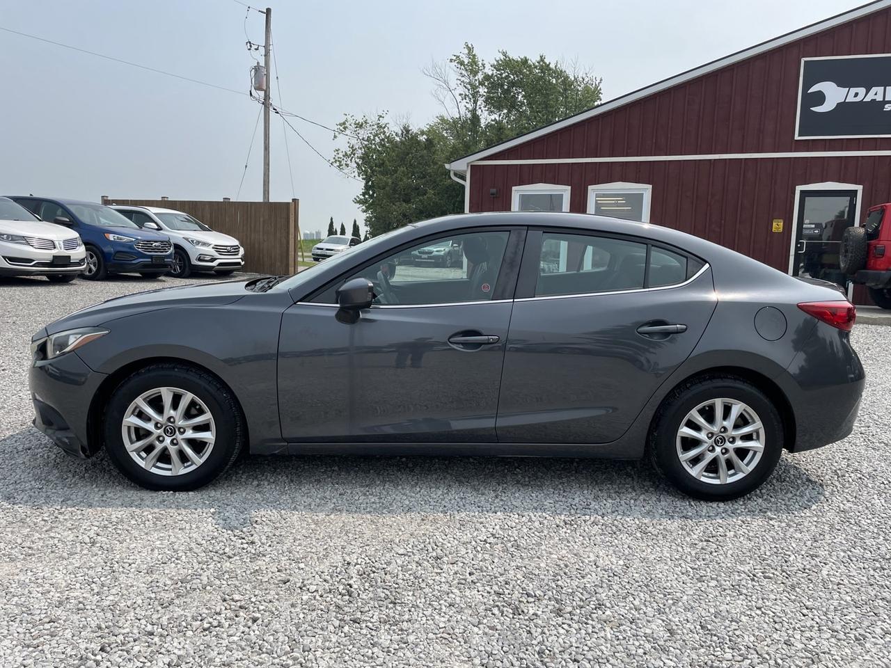 2015 Mazda MAZDA3 i Touring AT 4-Door Photo