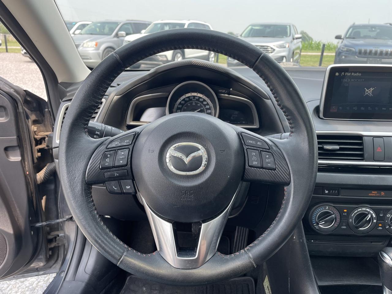 2015 Mazda MAZDA3 i Touring AT 4-Door Photo