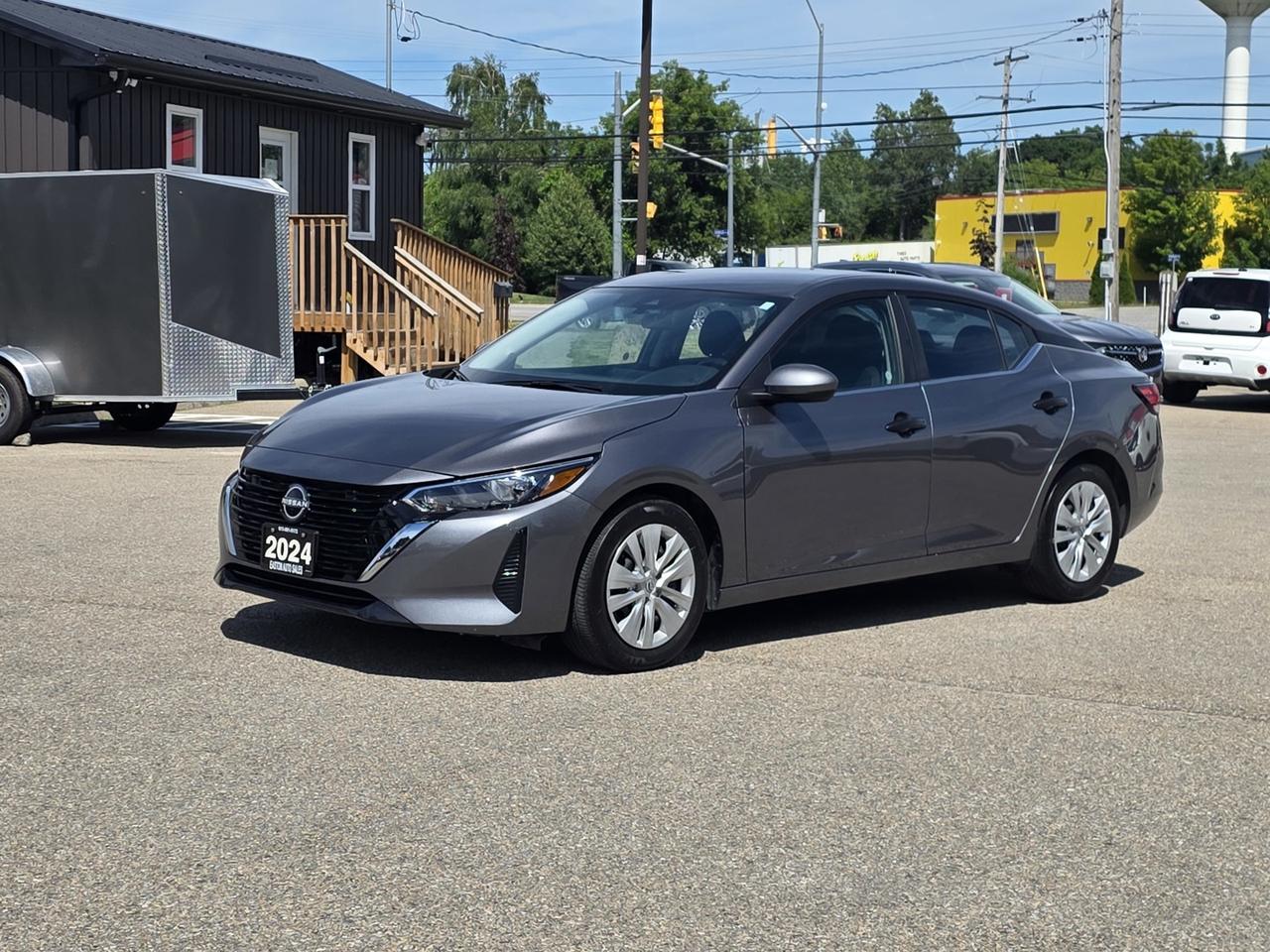 <p>Drive with confidence and enjoy outstanding fuel efficiency in this 2024 Nissan Sentra S Plus. Powered by a reliable 2.0L 4-cylinder engine and Front-Wheel Drive, this stylish sedan delivers a smooth, comfortable ride thats perfect for commuting, road trips, and everyday driving.</p><p>Inside, youll find a thoughtfully designed cabin equipped with features to keep you comfortable and connected. Stay warm during colder months with heated front seats, enjoy air conditioning on warmer days, and take advantage of Bluetooth connectivity, steering wheel-mounted controls, and cruise control for a more enjoyable driving experience. The back-up camera and Blind Spot Monitor provide added confidence behind the wheel, while power windows, power locks, power mirrors, and an adjustable steering wheel offer everyday convenience.</p><p>Combining modern technology, impressive fuel economy, and Nissans reputation for reliability, this 2024 Nissan Sentra S Plus is an excellent choice for drivers looking for exceptional value.</p><p>Call <strong>Easton Auto Sales</strong> today at <strong>613-561-5172</strong> to schedule your test drive.</p><p>We are <strong>OMVIC certified</strong> and a proud <strong>UCDA member</strong>. Conveniently located just minutes from <strong>Kingston and Brockville</strong>. We pay <strong>top dollar for trades</strong>, and be sure to check out our <strong>5-star Google rating</strong>!</p>