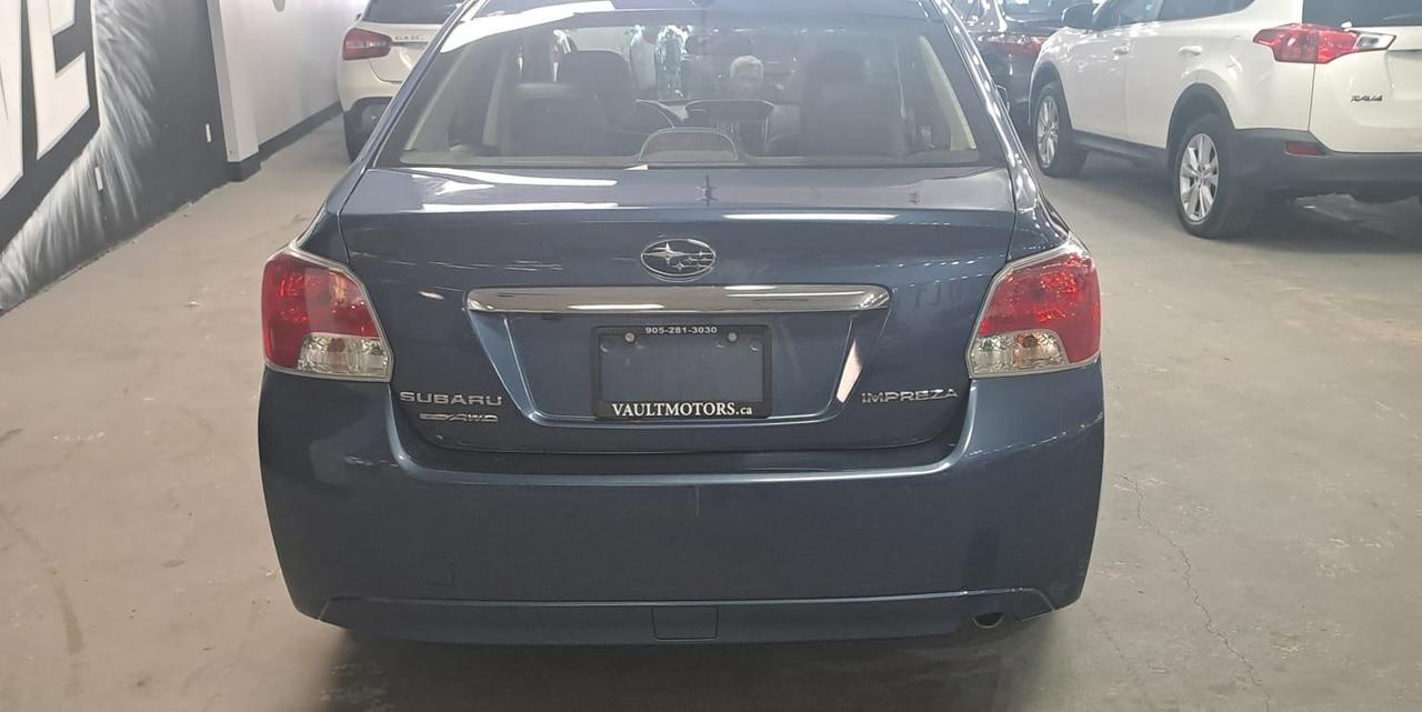 2013 Subaru Impreza 4dr Sdn CVT 2.0i w/Limited Pkg, AS IS Photo