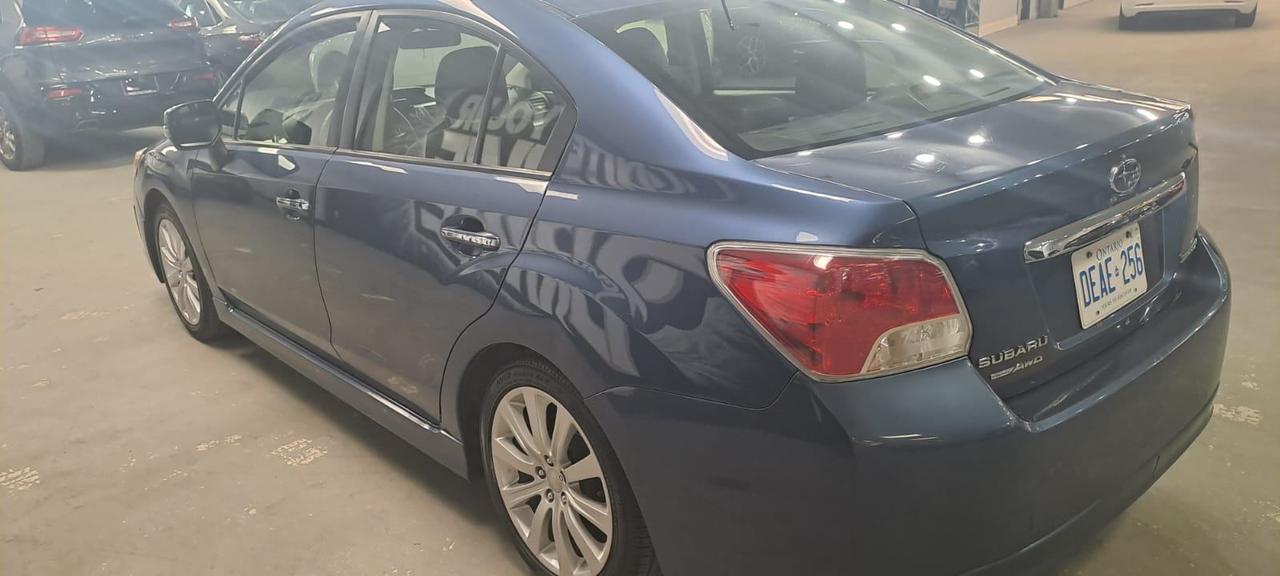 2013 Subaru Impreza 4dr Sdn CVT 2.0i w/Limited Pkg, AS IS Photo
