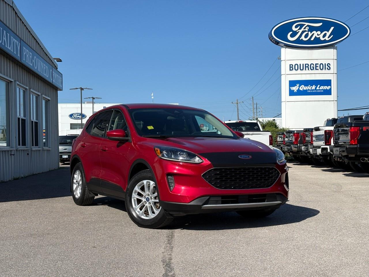 <p>The 2020 Ford Escape SE AWD in a vibrant red is a versatile SUV designed to tackle both urban and off-road adventures with ease. Its all-wheel drive system ensures confident handling in a variety of conditions.</p><p>Step inside to a spacious gray interior that promises comfort on every journey. The alloy wheels add a touch of sophistication to its robust appearance, while features like heated seats and mirrors ensure a cozy ride during Canadas chilly winters.</p><p>Stay connected and entertained with the Escapes advanced technology suite including a backup camera, Bluetooth connection, satellite radio, and smart device integration. With safety features like brake assist and lane assist, as well as conveniences such as keyless entry and power seats, the Escape is equipped to enhance your driving experience seamlessly. The auto start-stop technology of the 1.5L EcoBoost engine complements fuel efficiency, making it an ideal choice for those mindful of consumption.</p><p>The 2020 Ford Escape is perfect for families and adventurers alike, offering practicality and style for daily commutes or weekend getaways. Contact Bourgeois Motors Ltd. today to explore this remarkable vehicle and experience its capabilities firsthand.</p> <p><strong>Why Choose the Bourgeois Auto Group?</strong></p><p>For 80 years, Bourgeois Auto Group has been delivering exceptional automotive experiences. Our factor trained teams work to ensure you receive the shopping experience you deserve; whether you're looking for a new or new-to-you vehicle.</p><p>Shop 24/7 with our online showroom and chat service, ensuring convenience every step of the way. No hidden fees, full disclosure, and every pre-owned vehicle comes with a Carfax® report for peace of mind.</p><p>We offer a wide selection of pre-owned vehicles, all competitively priced using real-time market data. Get the best deal on your purchase and trade-in with our free Live Market Analysis report.</p><p>Looking to sell your car? We buy any make or modelno purchase required. Our simple to use online trade valuation tool will provide you with a clear, transparent selling experience whether you buy our car or not.</p><p>Backed by hundreds dedicated employees across 4 convenient locations, were here to meet all your automotive needs. Visit us in Midland or Parry Sound and explore our inventory or schedule your next service today.</p> <p><strong>Financing Your Next Vehicle with Bourgeois Motors Ford in Midland:</strong></p><p>At Bourgeois Motors Ford, we make financing your next vehicle simple and stress-free! Our team works with trusted lenders to find flexible options tailored to your budget. Drive away with confidenceapply today!</p><p>Take advantage of our online pre-qualification tool, backed by Equifax and TD Bank to find the payment that works for you. Simply <a href=https://www.bourgeoismotors.com/free-credit-check/ rel=nofollow><strong>CLICK HERE</strong></a><strong> </strong>to use our secure online credit tool with no impact to your credit.</p>