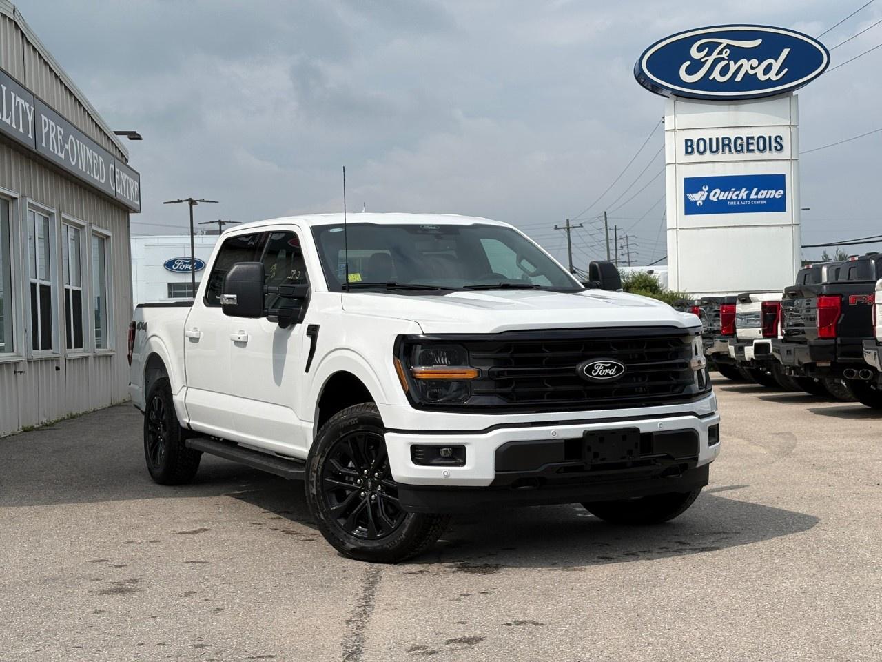 <p>The 2026 Ford F-150 XLT 4WD SuperCrew is a powerhouse on wheels, offering remarkable stability and performance with its 4×4 drivetrain. This new truck in a crisp white exterior is a stunning sight, perfectly complemented by the XLT Black Appearance Package which includes striking black grille, badges, and dual exhaust with black tips.</p><p>Step inside the sophisticated black interior where functionality meets comfort. The cloth front seats feature a console and lid, while the tray style floor liner with carpet mats keeps the interior pristine. The F-150 stands out with features like heated mirrors and manually folding heated power glass trailer tow mirrors, making every journey convenient.</p><p>Advanced technology enhances your driving experience with a host of features such as smart device integration, a backup camera, and a Wi-Fi hotspot. Safety is top priority with lane assist, brake assist, and parking sensors ensuring peace of mind on every drive. The electronic 10-speed automatic transmission offers selectable drive modes including ECO, sport, and tow/haul, providing flexibility for any terrain or driving style.</p><p>With its powerful 3.5L V6 EcoBoost engine and integrated trailer brake controller, this F-150 is ideal for those who demand versatility and strength, whether for work or play. Potential truck enthusiasts looking for an impeccable blend of style and capability should contact Bourgeois Motors Ltd. for more information or a test drive today.</p> <p><span style=color:rgb( 58 , 80 , 95 )>The discount shown on vehicle represents the </span><u>Cash Purchase</u><span style=color:rgb( 58 , 80 , 95 )> discount and is inclusive of all non-stackable and stackable cash purchase discounts from Ford of Canada and Bourgeois Motors Ltd. and is offered in lieu of sub-vented lease or finance rates. To get details on current discounts applicable to this and other vehicles in our inventory for Lease and Finance customer, see a member of our team. All offers for lease or finance are On Approved Credit (OAC).While every effort is made to ensure the accuracy of discounts and programs, programs are subject to change without notice </span><span style=color:rgb( 119 , 119 , 119 )>and may not be accurate or completely current. While every reasonable effort is made to ensure the accuracy of this data, we are not responsible for any errors or omissions contained on these pages.</span></p> <p><strong>Why Choose the Bourgeois Auto Group?</strong></p><p>For 80 years, Bourgeois Auto Group has been delivering exceptional automotive experiences. Our factor trained teams work to ensure you receive the shopping experience you deserve; whether you're looking for a new or new-to-you vehicle.</p><p>Shop 24/7 with our online showroom and chat service, ensuring convenience every step of the way. No hidden fees, full disclosure, and every pre-owned vehicle comes with a Carfax® report for peace of mind.</p><p>We offer a wide selection of pre-owned vehicles, all competitively priced using real-time market data. Get the best deal on your purchase and trade-in with our free Live Market Analysis report.</p><p>Looking to sell your car? We buy any make or modelno purchase required. Our simple to use online trade valuation tool will provide you with a clear, transparent selling experience whether you buy our car or not.</p><p>Backed by hundreds dedicated employees across 4 convenient locations, were here to meet all your automotive needs. Visit us in Midland or Parry Sound and explore our inventory or schedule your next service today.</p> <p><strong>Financing Your Next Vehicle with Bourgeois Motors Ford in Midland:</strong></p><p>At Bourgeois Motors Ford, we make financing your next vehicle simple and stress-free! Our team works with trusted lenders to find flexible options tailored to your budget. Drive away with confidenceapply today!</p><p>Take advantage of our online pre-qualification tool, backed by Equifax and TD Bank to find the payment that works for you. Simply <a href=https://www.bourgeoismotors.com/free-credit-check/ rel=nofollow><strong>CLICK HERE</strong></a><strong> </strong>to use our secure online credit tool with no impact to your credit.</p>