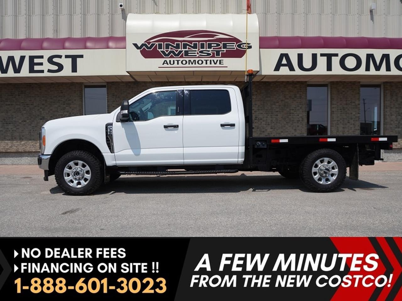 *** Dealer arranged financing on site! Quick, Simple,  no calls or waiting on bank appointments required!! Drive away today ***   NO ADMINISTRATION FEES!!NO ADMINISTRATION FEES!!*** Dealer-arranged financing on site! Quick, Simple, no calls or waiting on bank appointments required!! Drive away today ***  

2023 FORD F-350 Super Duty XLT 4WD W/ FLAT DECK!!!  ***Godzilla 7.3L V8 GAS ENGINE*** - - Tow Package - - Backup camera - - Hill descent assist - - Tow Hooks - - 10 Speed Automatic Transmission - - Selectable Drive Modes - - Cruise control - - Headache rack - - Power Drivers Seat - - FORD SYNC&reg; Touchscreen infotainment System - - Bluetooth  - - WIFI  - - Power windows, locks and mirrors - - Keyless entry - - Steering wheel controls - - Heated Mirrors - - Full-length running boards  - - Power Pedals. 

Sharp Oxford white exterior in excellent condition. Spacious interior. 6 Passenger configuration. 

Excellent history. A great addition to your fleet.

Features
- Godzilla 7.3L V8 gas engine
- 430 horsepower and 485 lb-ft of torque
- Four-Wheel Drive
- 10 Speed Automatic Transmission
- Powered Drivers Seat
- 6-Passenger seating (with large fold-down center console)
- Steering wheel controls
- Cruise control
- Touchscreen infotainment system
- Bluetooth connectivity  
- Backup camera
- Parking assistance
- Towing mirrors
- Heated Mirrors
- Manual-telescoping/folding mirrors
- Mirror-integrated turn signals 
- Fog lights 
- Tow hooks
- Power Windows and Locks
- Selectable Drive Modes
- Trailer Towing Package
- Flat deck
- Headache rack
- Tire pressure monitoring system 

Comes with a Manitoba Safety Certification, and we have many Extended Powertrain warrantys available on your vehicle purchase up to 10-year coverage (on eligible vehicles see dealer for details). Financing on site with Zero down financing OAC. Trades accepted. View at Winnipeg West Automotive Group, 5195 Portage Ave. (only a couple of minutes past the new Costco) Dealer permit # 6007, Call now 1(888) 601-3023. This Car is located in Winnipeg Manitoba, however we can have it shipped anywhere in North America relatively inexpensively.Comes with a Manitoba Safety Certification, and we have many Extended Powertrain warranties available on your vehicle purchase up to 10-year coverage (on eligible vehicles see dealer for details). Financing on site with Zero down financing OAC. Trades accepted. View at Winnipeg West Automotive Group, 5195 Portage Ave. (only a couple of minutes past the new Costco) Dealer permit # 6007, Call now 1(888) 601-3023. This Car is located in Winnipeg Manitoba,  however we can have it shipped anywhere in North America relatively inexpensively.