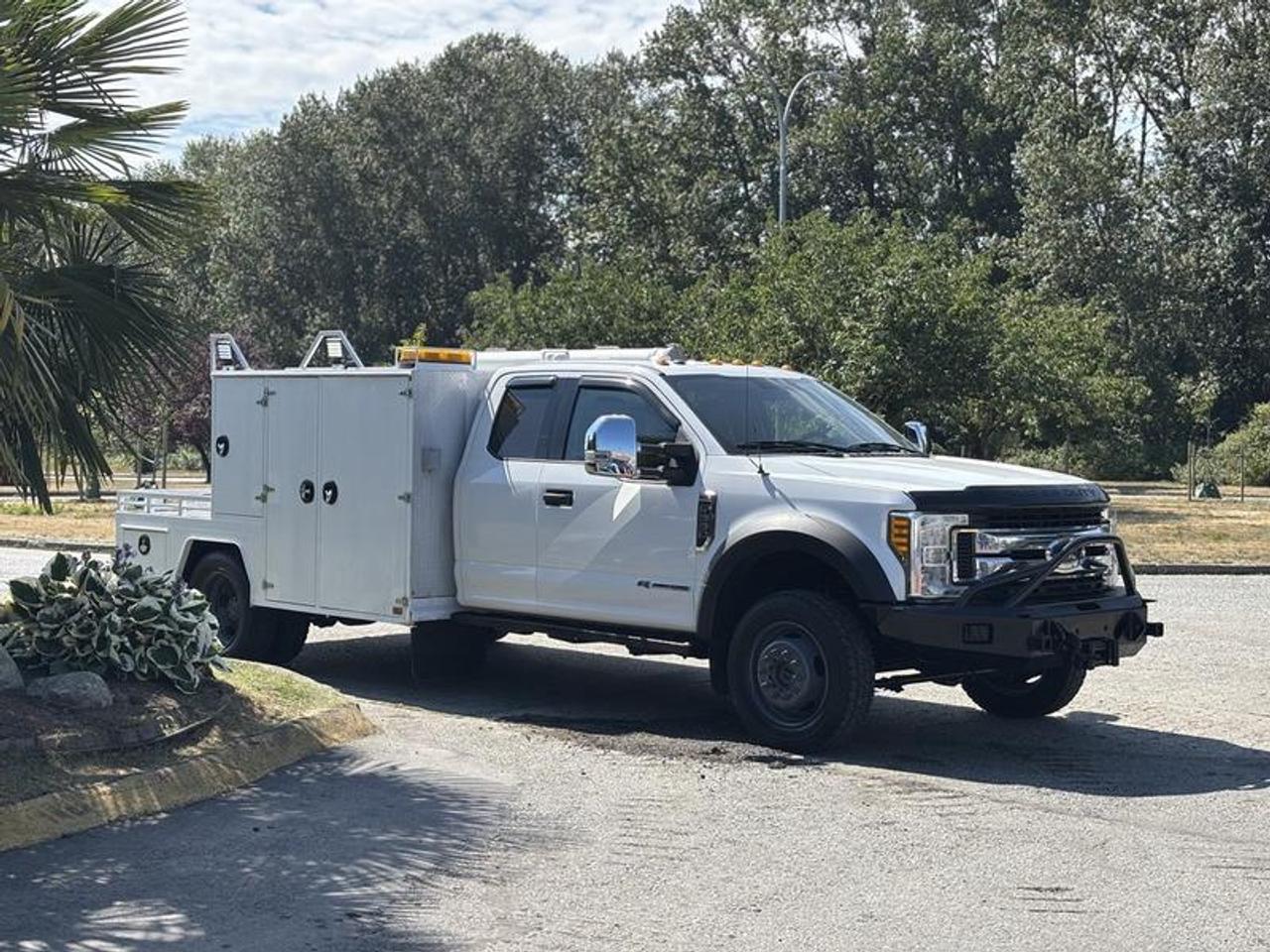 This 2017 Ford F-550 XLT SuperCab is powered by a 6.7L Power Stroke V8 turbo diesel engine paired with an automatic transmission and four-wheel drive. Equipped with a commercial service body, this truck is configured for contractors, utility crews, municipalities, and fleet service applications requiring secure storage and equipment transport.

The service body features aluminum storage cabinets, toolboxes with sliding drawers, a small rear deck, and an auxiliary fuel cell for carrying additional fuel. Additional equipment includes a winch, trailer hitch receiver, beacon and work lights, NightRay remote lighting controls, Golight remote spotlight, Bluetooth connectivity, automatic headlights, cruise control, air conditioning and heat, and power windows, power door locks, and power mirrors.

Finished in white with a gray cloth interior, this Ford F-550 XLT combines four-wheel-drive capability with a commercial service body and diesel powertrain for a variety of fleet and vocational applications. This item is currently OFFSITE. You must register an appointment with our office to schedule an offsite viewing. Appointments must be made a minimum of one business day in advance (and as defined by the days that Repo.com is open for business) before your appointment can be scheduled and confirmed. We may, at our own discretion, instead opt to transport smaller items to Repo.coms main yard for viewing purposes.  $49,830.00 plus $375 processing fee, $50,205.00 total payment obligation before taxes.   Listing report, warranty, contract commitment cancellation fee, financing available on approved credit (some limitations and exceptions may apply). All above specifications and information is considered to be accurate but is not guaranteed and no opinion or advice is given as to whether this item should be purchased. We do not allow test drives due to theft, fraud, acts of vandalism and undetectable impaired driving. Instead we provide the following benefits: Complimentary Warranty (with options to extend), Limited Money Back Satisfaction Guarantee on Fully Completed Contracts, Contract Commitment Cancellation, and an Open-Ended Sell-Back Option. Ask seller for details or call 604-522-REPO(7376) to confirm listing availability.