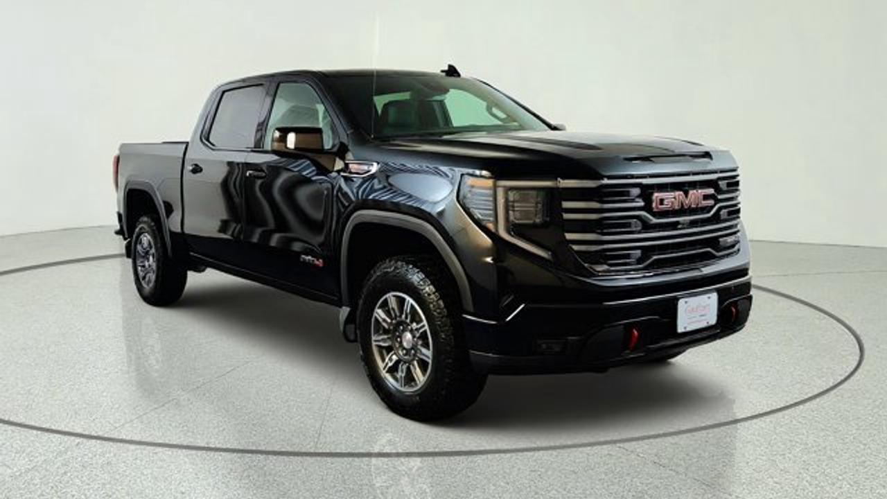 The 2026 GMC Sierra 1500 AT4 brings a serious dose of off-road capability to the full-sized pickup segment, featuring a factory-installed 2-inch suspension lift with off-road tuned components and Rancho monotube shocks. Under the hood it pairs the rugged 6.2 litre V8 engine with a 10-speed automatic transmission. Inside, the cabin features premium touches like perforated leather front seats in Jet Black with Kalahari accents, power sunroof and a 13.4-inch touchscreen infotainment system with Google Built-In.