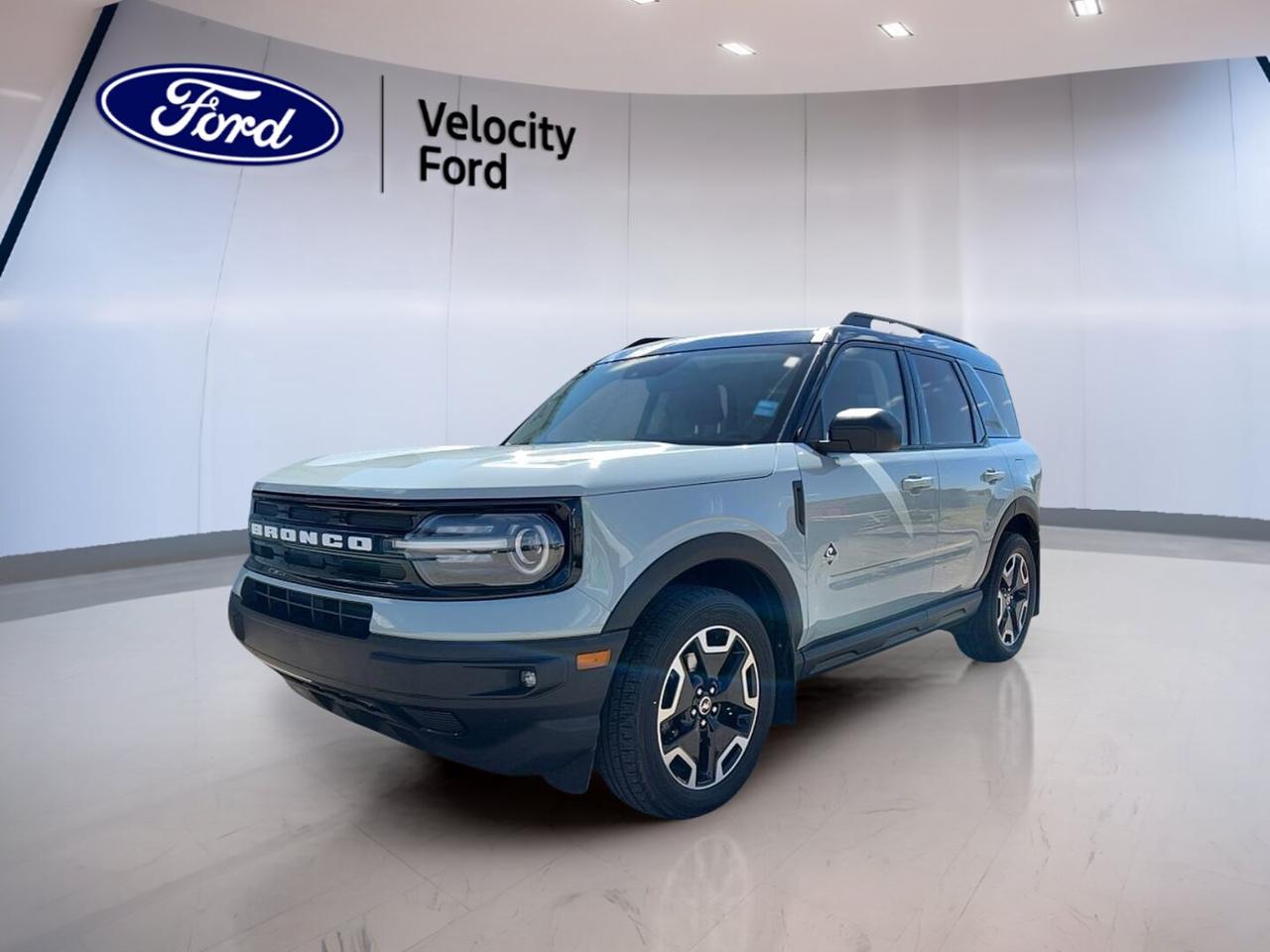 // ACCIDENT FREE!! //

Built for Canadian roads and ready for daily life, this 2021 Ford Bronco Sport Outer Banks 4x4 offers rugged confidence with smart comfort. CARFAX Canada reports no accident, giving you added peace of mind. Finished in Grey with a Brown interior, this used SUV blends style, utility, and sure-footed four-wheel drive.

With 62,794 km on the odometer, this 2021 Ford Bronco Sport Outer Banks 4x4 still has plenty to offer. Its 1.5-litre unleaded engine works with an 8-speed automatic transmission for smooth, easy driving. Four doors, practical cargo access, and a refined cabin make it a strong fit for workdays and weekends.

FEATURES OF THE Bronco Sport Outer Banks 4x4
»» Standard four-wheel drive for added traction
»» 1.5-litre EcoBoost engine with automatic transmission
»» Grey exterior with Brown interior
»» Spacious four-door SUV body style

ADVANCED SAFETY FEATURES
»» Backup camera helps with reversing confidence
»» Blind spot monitor adds lane awareness
»» Lane departure warning supports safer travel
»» Side and head airbags enhance protection

PERFORMANCE AND EFFICIENCY
»» 1.5-litre engine balances power and economy
»» Eight-speed automatic delivers smooth shifting
»» Four-wheel drive improves year-round capability
»» Power steering supports easy city handling

COMFORT AND CONVENIENCE
»» Heated front seats for cold mornings
»» Dual-zone climate control adds cabin comfort
»» Remote starter helps warm vehicle early
»» Power driver seat includes lumbar support

TECHNOLOGY AND CONNECTIVITY
»» Bluetooth integration supports hands-free calling
»» WiFi hotspot keeps devices connected
»» Steering wheel audio controls add ease
»» Satellite radio expands entertainment choices

CARGO SPACE
»» Rear trunk access simplifies loading gear
»» Four-door layout improves passenger entry
»» Spare tire adds travel peace
»» Flexible SUV cabin suits daily errands

AWARDS & RECOGNITIONS
»» Top Safety Pick, Insurance Institute for Highway Safety, 2021
»» Best Sub-Compact Utility, Automobile Journalists Association of Canada, 2021

WHAT OTHER OWNERS LIKE
»» Confident all-weather traction from four-wheel drive
»» Easy-to-use controls and smart technology
»» Comfortable ride with useful cargo room
»» Heated seats and remote start convenience

This 2021 Ford Bronco Sport Outer Banks 4x4 stands out with useful features that drivers want every day. You also get cruise control, anti-lock braking system, stability control, child safety locks, heated mirrors, power windows, automatic headlights, fog lights, tire pressure monitoring, push button start, and an auto-dimming rearview mirror.

Inside, this 2021 Ford Bronco Sport Outer Banks 4x4 is designed to keep each drive simple and comfortable. Front air conditioning, automatic climate control, tinted windows, illuminated vanity mirrors, and an adjustable steering wheel help create a pleasant space. The leather-wrapped steering wheel adds a premium touch without taking away from the practical layout.

At Velocity Ford in Moose Jaw, this 2021 Ford Bronco Sport Outer Banks 4x4 is a smart choice for drivers who want comfort, capability, and proven peace of mind. Its accident-free CARFAX Canada history, versatile SUV design, and well-equipped feature list make it an easy vehicle to enjoy in every season.

This 2021 Ford Bronco Sport Outer Banks 4x4s VIN is: 3FMCR9C68MRB28835.