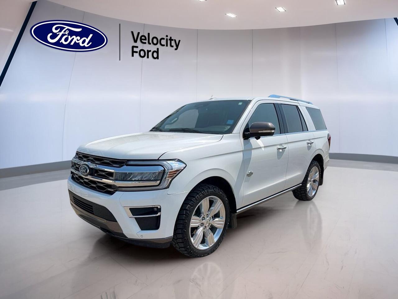 // ACCIDENT FREE!! //

Drive with full-size confidence in this 2023 Ford Expedition King Ranch 4x4 at Velocity Ford in Moose Jaw. CARFAX Canada reports no accident, and the low 16,133 km adds extra appeal. Finished in White with a Brown interior, this used SUV blends premium comfort, strong capability, and smart family-ready versatility.

The 2023 Ford Expedition King Ranch 4x4 is powered by a 3.5-litre unleaded engine paired with an automatic transmission and four-wheel drive. With four doors, a roomy cabin, and upscale details throughout, it is built for daily ease, long highway trips, and year-round Prairie driving with comfort and control.

FEATURES OF THE Expedition King Ranch 4x4
»» White exterior with rich Brown interior
»» Panoramic sunroof adds open-air cabin feel
»» Power retractable running boards for easy entry
»» Navigation system supports confident trip planning

ADVANCED SAFETY FEATURES
»» Backup camera helps with reversing visibility
»» Blind spot monitor adds lane-change awareness
»» Lane departure warning supports safer travel
»» Multiple airbags help protect all occupants

PERFORMANCE AND EFFICIENCY
»» 3.5-litre unleaded engine delivers strong output
»» Four-wheel drive adds year-round traction
»» Automatic transmission shifts smoothly and quickly
»» Stability control helps maintain road confidence

COMFORT AND CONVENIENCE
»» Heated front seats help on cold mornings
»» Heated rear seats add passenger comfort
»» Dual-zone climate control improves cabin comfort
»» Memory seats simplify shared driver settings

TECHNOLOGY AND CONNECTIVITY
»» Bluetooth integration supports hands-free communication
»» WiFi hotspot keeps devices connected
»» Satellite radio expands entertainment choices
»» Steering wheel audio controls aid convenience

CARGO SPACE
»» Power liftgate helps with loading ease
»» Large SUV layout supports family cargo
»» Spare tire adds travel peace of mind
»» Rear spoiler complements utility and style

AWARDS & RECOGNITIONS
»» Best Large Utility Vehicle, AutoTrader Awards, 2023

WHAT OTHER OWNERS LIKE
»» Smooth power for highway passing confidence
»» Spacious cabin for family road trips
»» Comfortable ride on long drives
»» User-friendly tech for daily convenience

This Ford offers many sought-after features, including cruise control, power steering, ABS, child safety locks, remote starter, heated mirrors, power windows, front and rear air conditioning, adjustable pedals, automatic headlights, fog lights, tire pressure monitoring, rear climate control, HD Radio, auto-dimming rearview mirror, turn signal mirrors, and LED headlamps.

You will also appreciate the driver-focused comfort, with a power drivers seat, power passenger seat, driver and passenger lumbar support, adjustable steering wheel, leather steering wheel, ambient lighting package, push button start, rear audio controls, tinted windows, and illuminated vanity mirrors. This Expedition is well equipped for busy families and drivers who want a premium full-size SUV.

This 2023 Ford Expedition King Ranch 4x4s VIN is: 1FMJU1P86PEA31899.